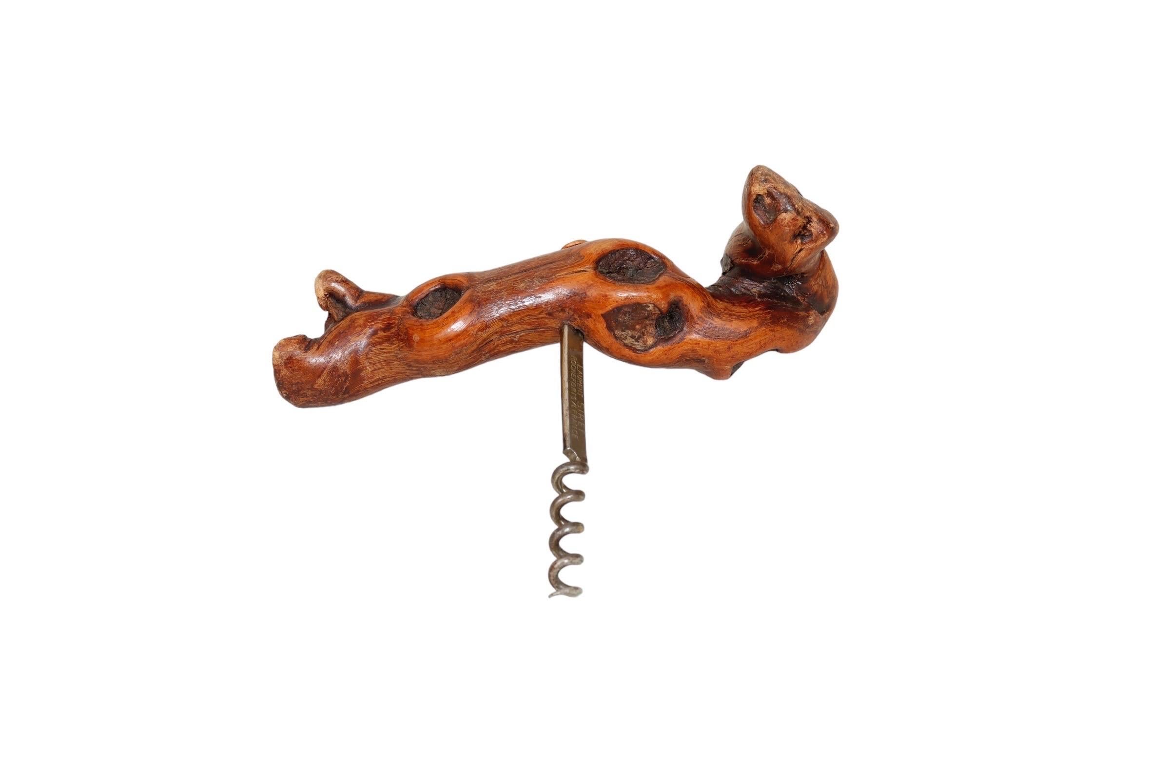 A French Laurent Siret direct pull corkscrew circa 1940. Made with a grapewood handle and steel worm, marked Laurent Siret and Rochfort sur Loire on the stem. Rochfort sur Loire is the area of France where the Laurent Sirets company started in 1925. 