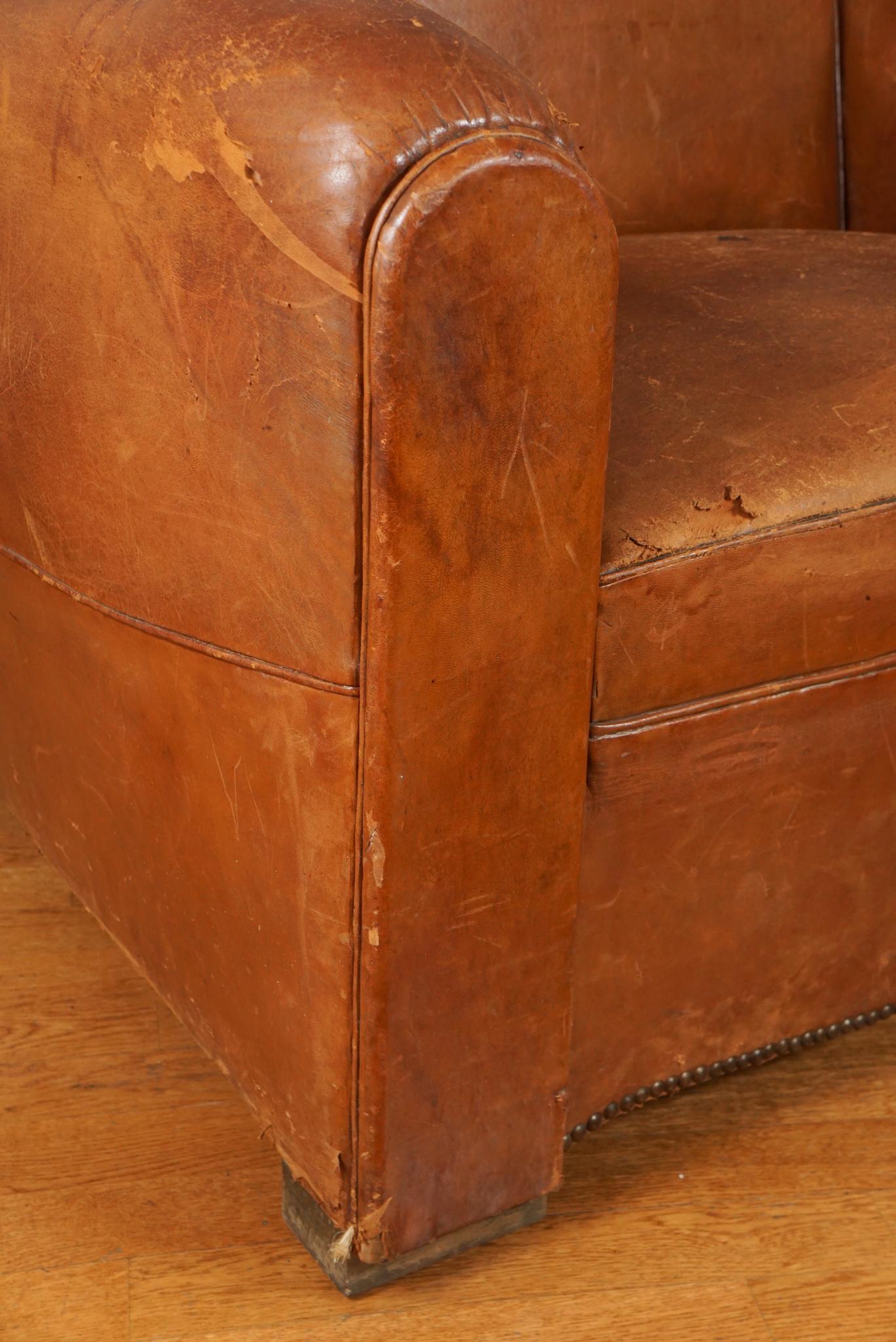 1940s French Leather Convertible Club Chair In Distressed Condition For Sale In Hudson, NY