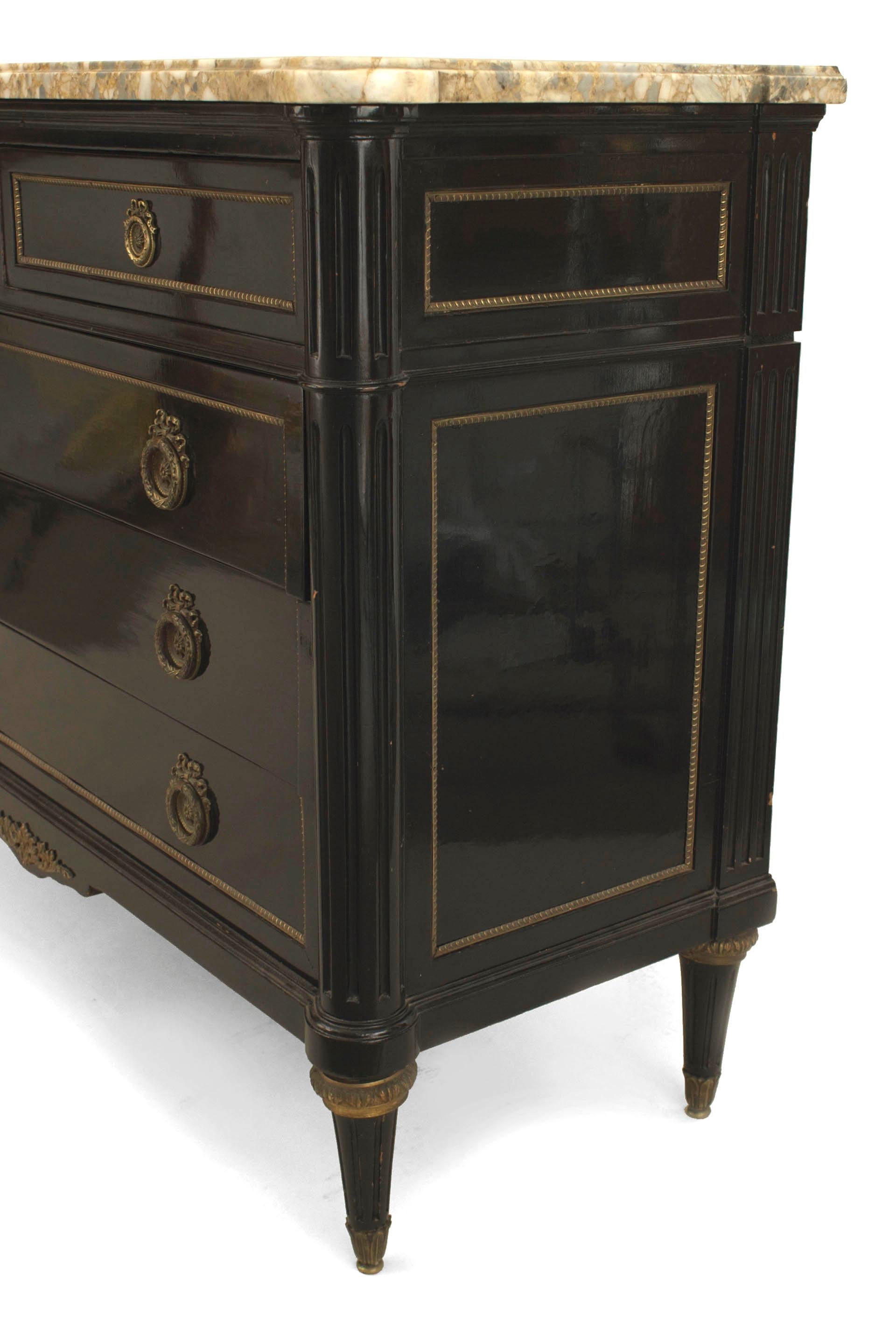 French 1940s (Louis XVI style) ebonized and bronze trimmed chest with three drawers over a pair of smaller drawers all having wreath and ring handles with a yellow marble top (Stamped: JANSEN).

Maison Jansen was a Paris-based interior