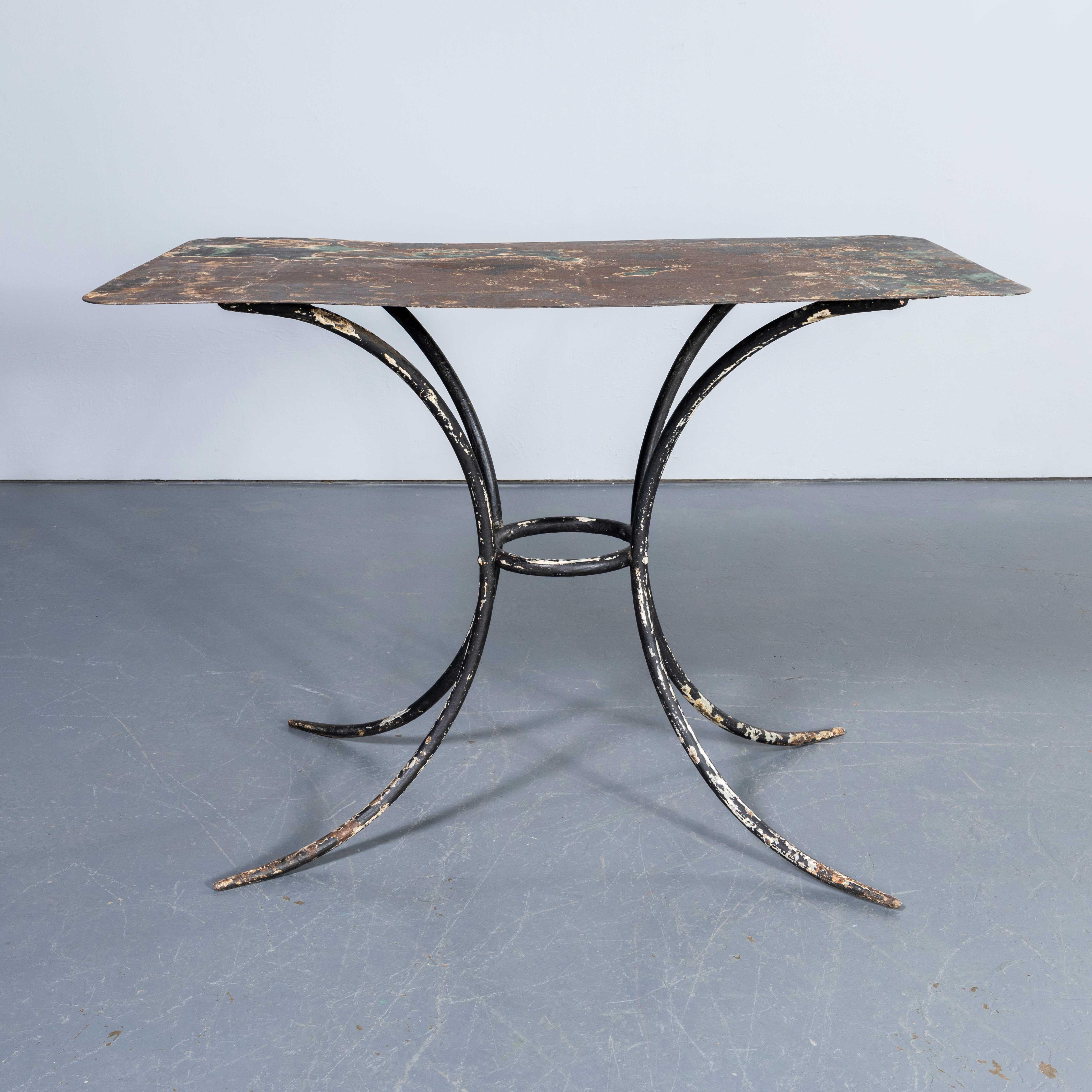 1940's French Metal Rectangular Outdoor Dining Table - Splayed Base. 
Classic early French table with a very elegant splayed base with tapered feet. The solid bar hand shaped legs are joined with a solid bar support. The table is in excellent