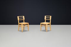 1940s French Mid-Century Modern Oak and Cane Side Chairs by Pierre Cruège