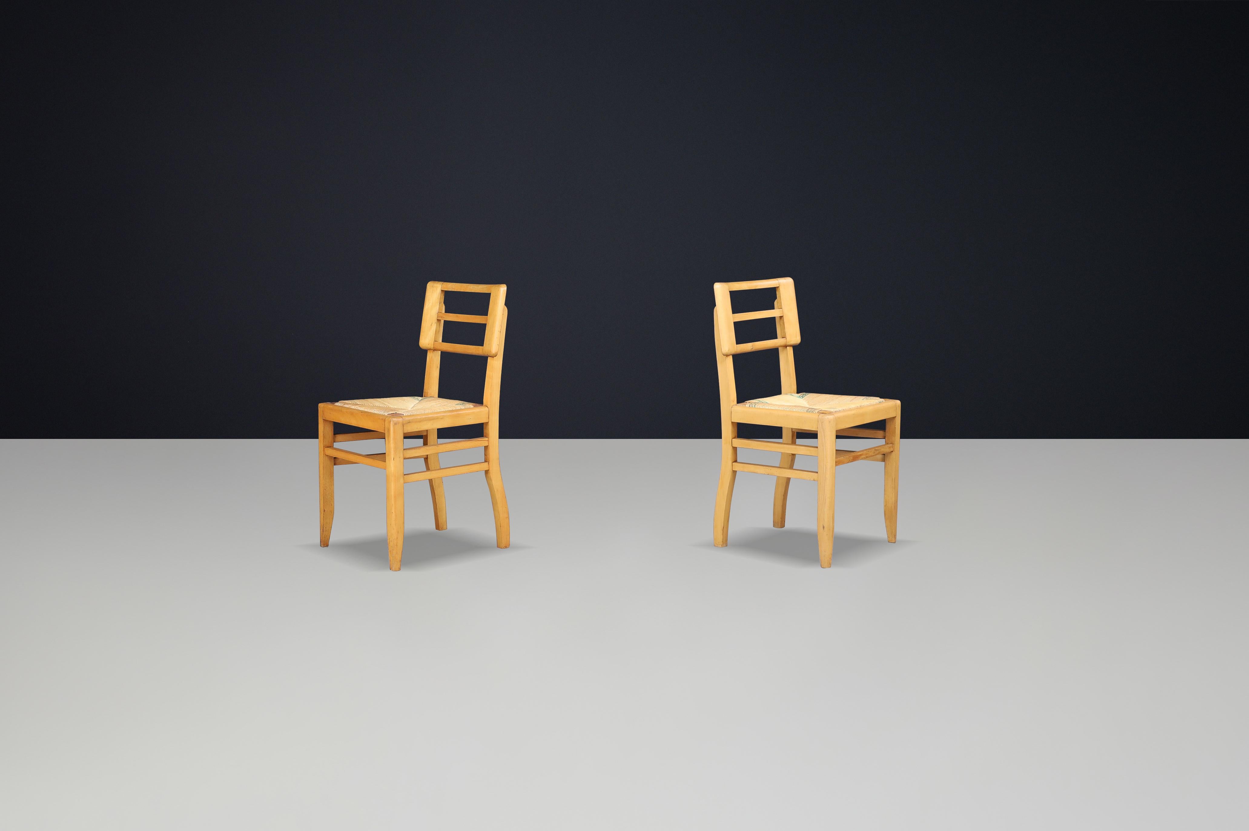 20th Century 1940s French Mid-Century Modern Oak and Cane Side Chairs by Pierre Cruège For Sale