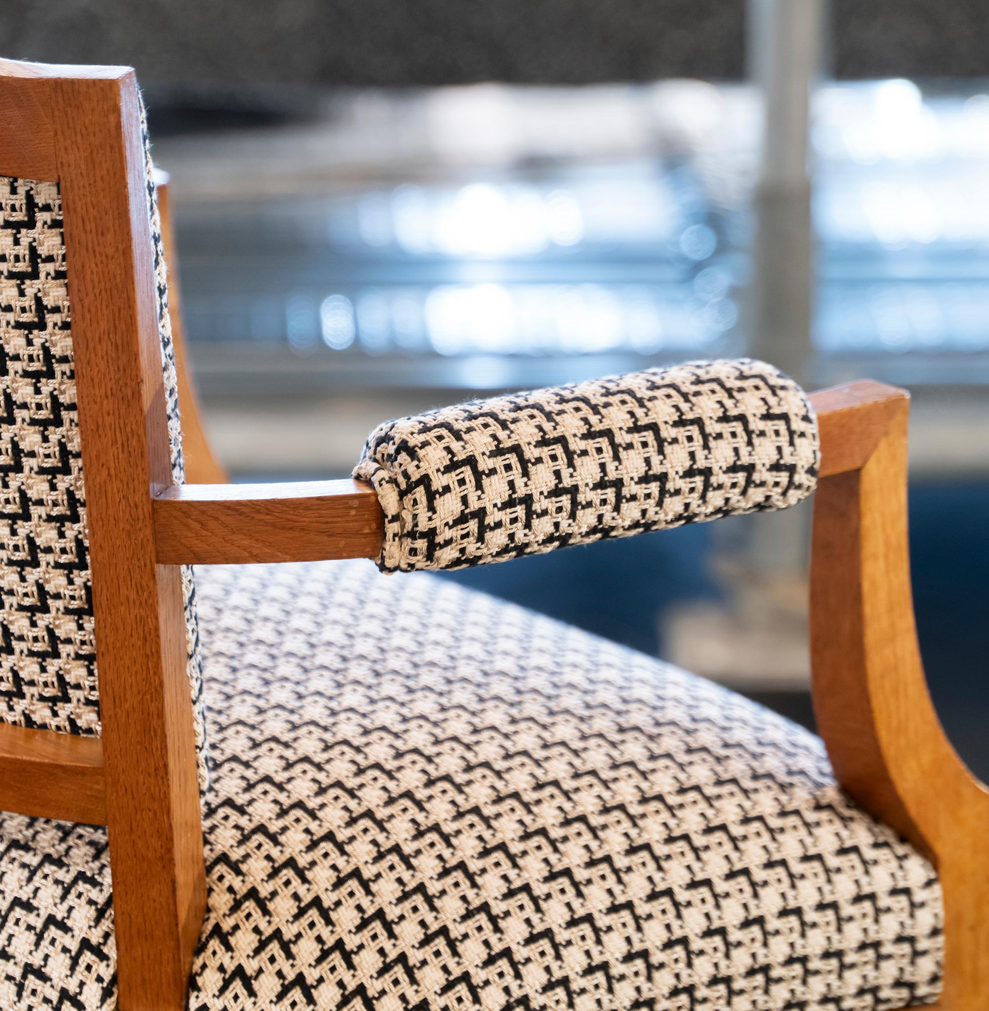 Oak armchair with perfect vintage patina, new black and white upholstery fabric, France, circa 1940.