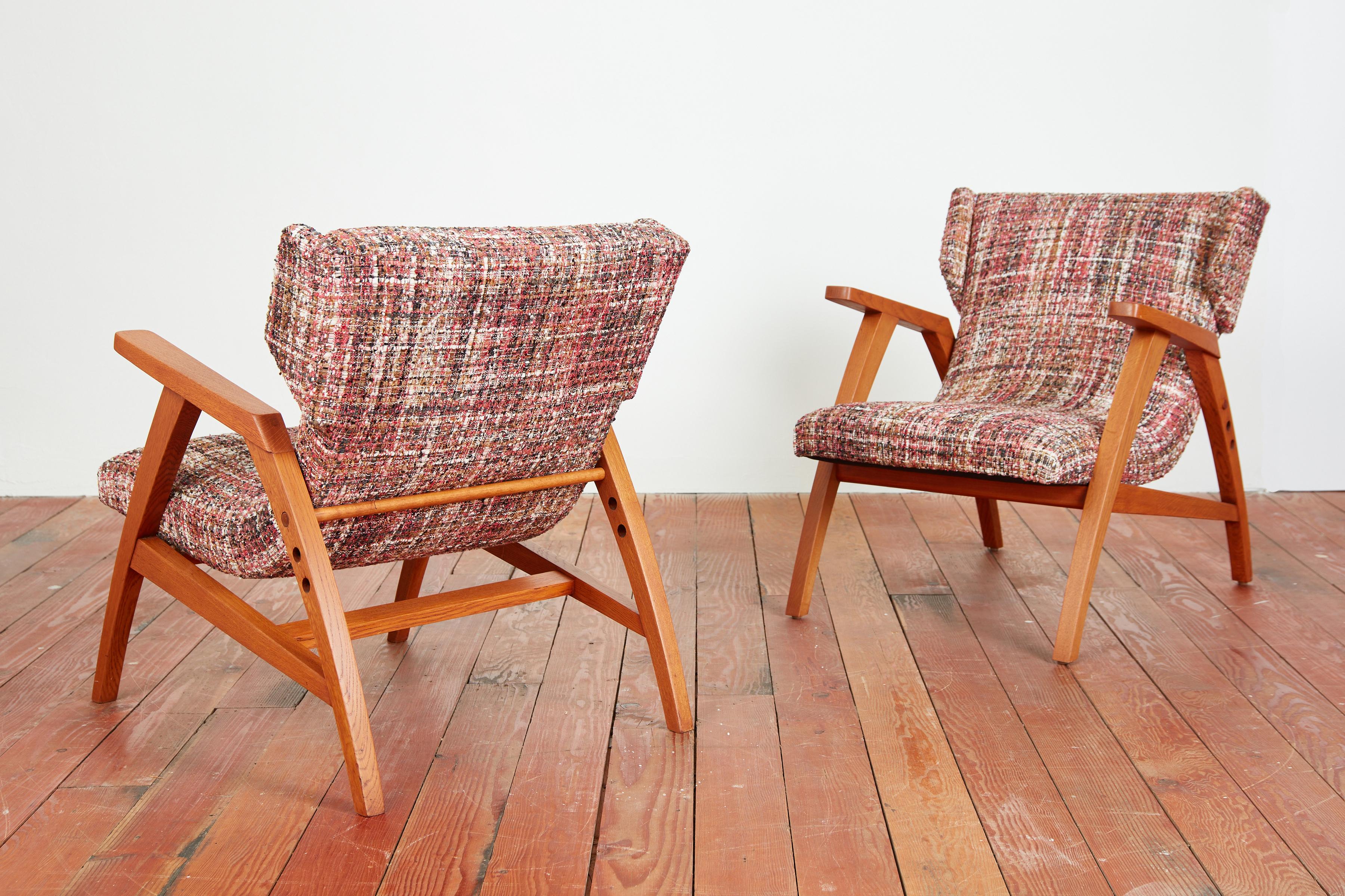 Wonderful pair of French Oak chairs with wingback floating seats - newly upholstered in 