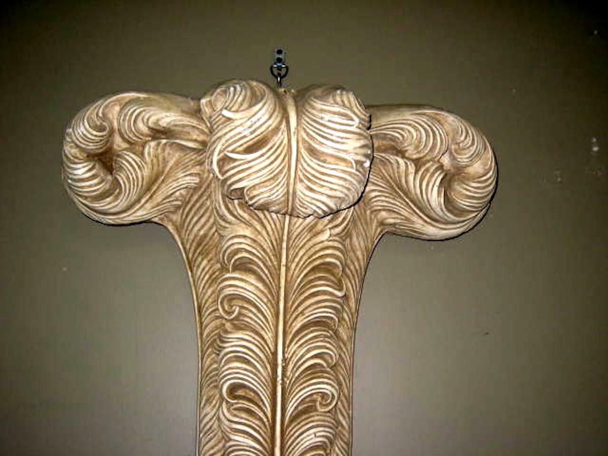 1940s French decorative plaster feather motif wall sculpture.
Two are available.