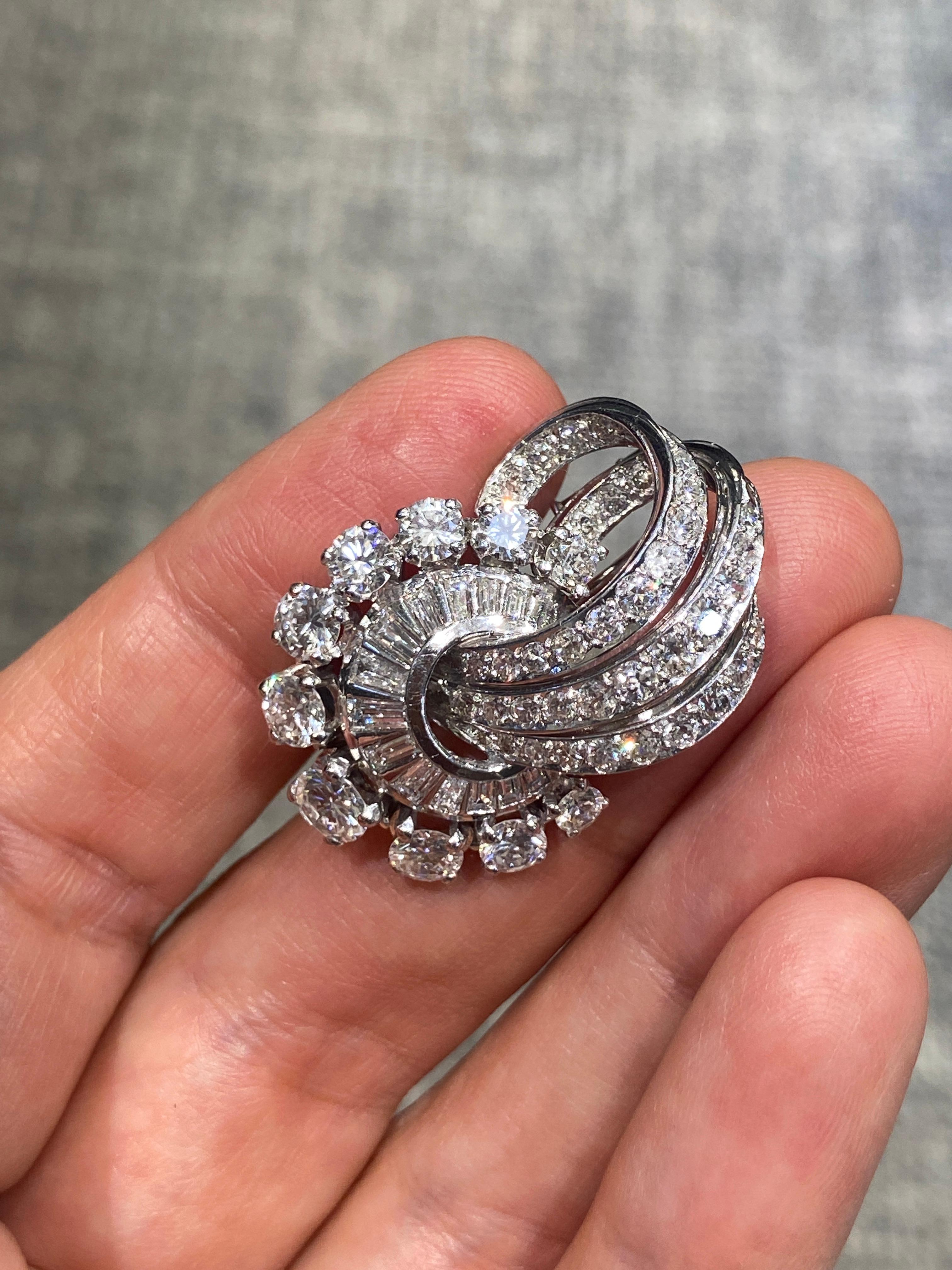 This charming 1940s French diamond brooch is made of platinum and adorned with approximately 4 carats of F colour VS2 clarity old European cut diamonds. It is a delight to behold.