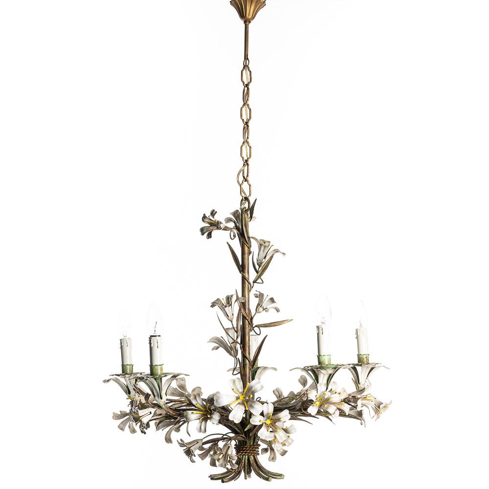 Stunning 4 light fixture with painted Lily's white and yellow polychromed metal Toleware. Faux wax candlestick light holders on a green holder mounted on a white lily. Gold and Green color through out the base. 
We have a third piece that is almost