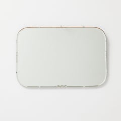 1940s French Rounded Mirror with Visible Clips and Patina