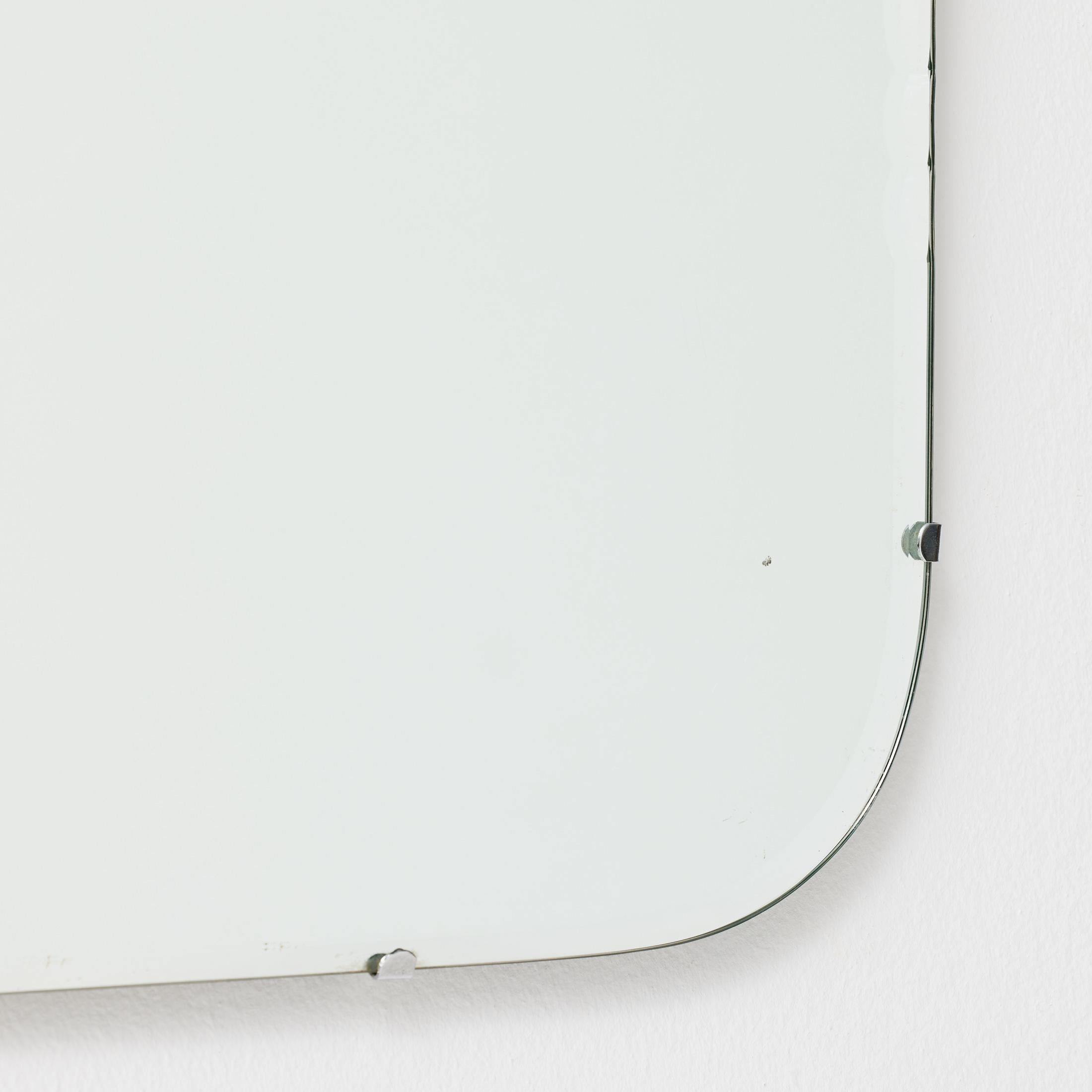 Mid-20th Century 1940s French Rounded Mirror with Visible Clips and Patina For Sale