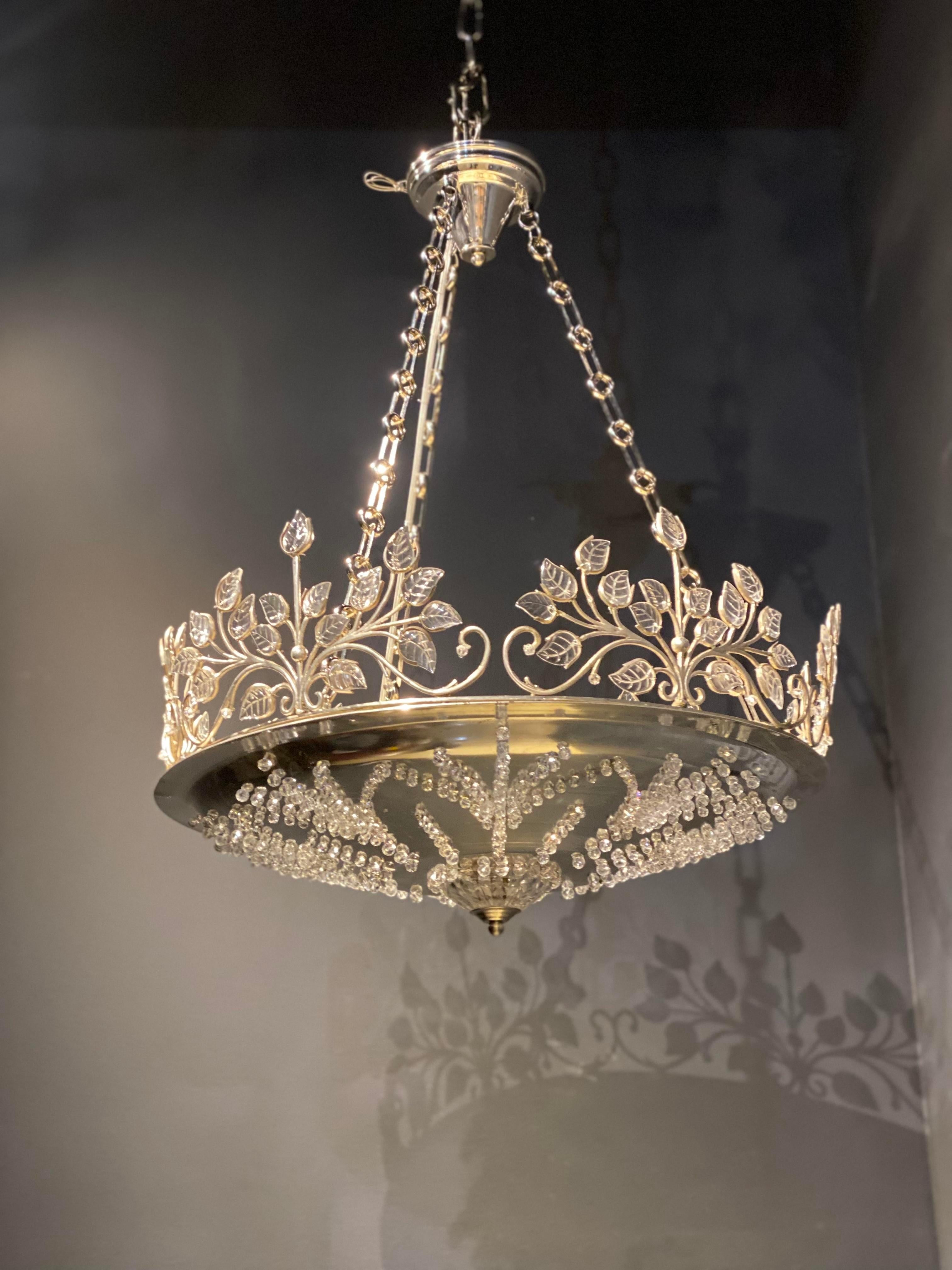 A circa 1940’s French silver plated light fixture with interior lights and glass leaves 