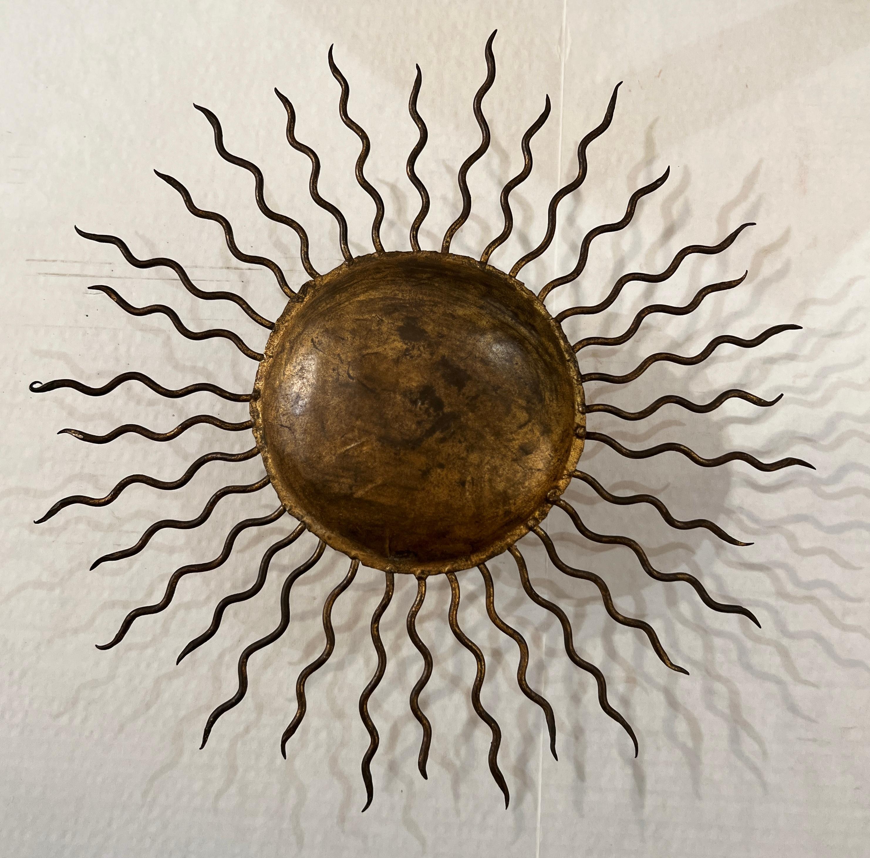 1940's French Sunburst-like wall or ceiling light fixture. Elegant, compact, and radiates timeless charm. 
Certified for use in US.
125v 75w
Other model number or reference number in the socket E304097  2 E12-3173 
