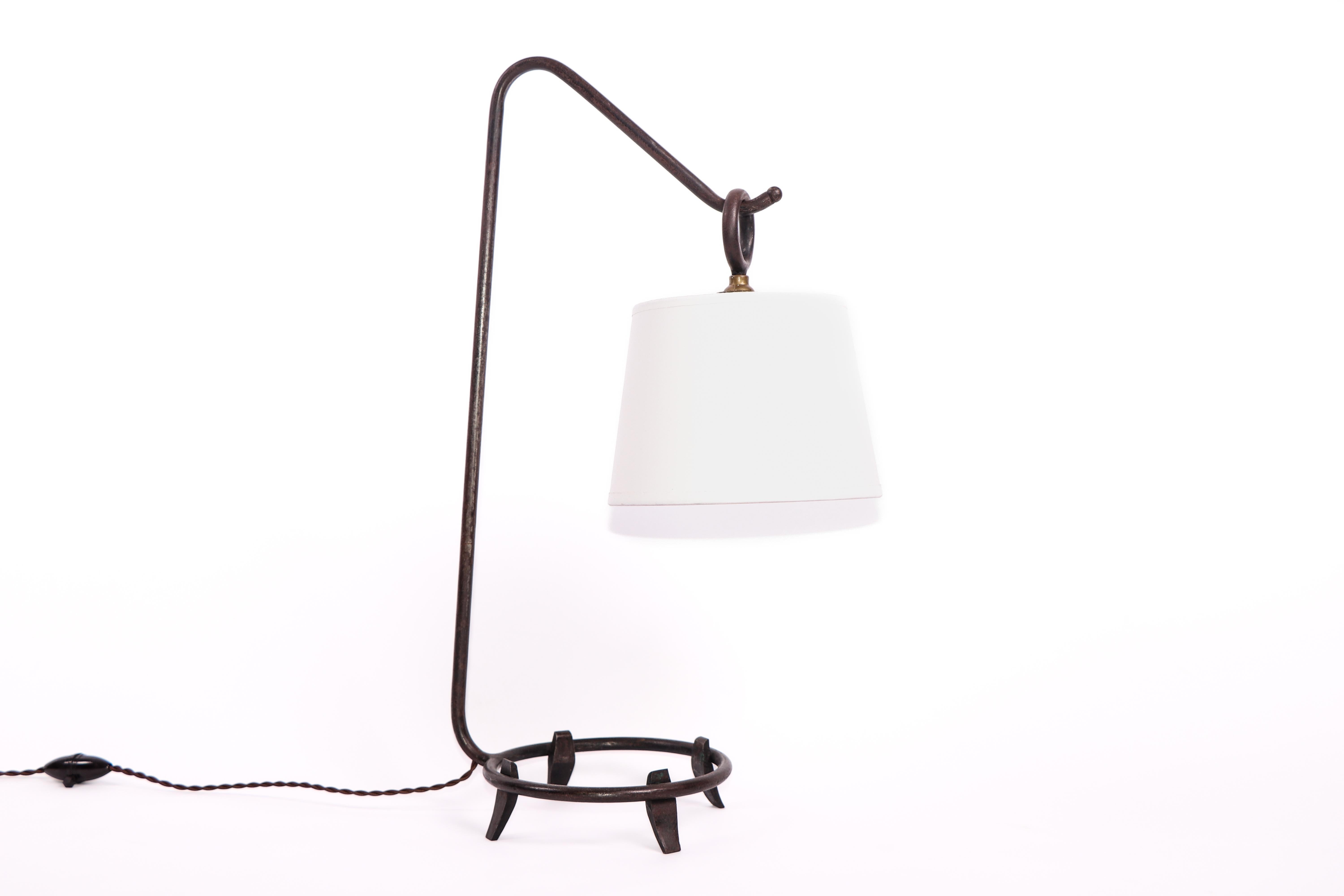 Lovely 'lantern' table lamp in wrought iron with paper lampshade.