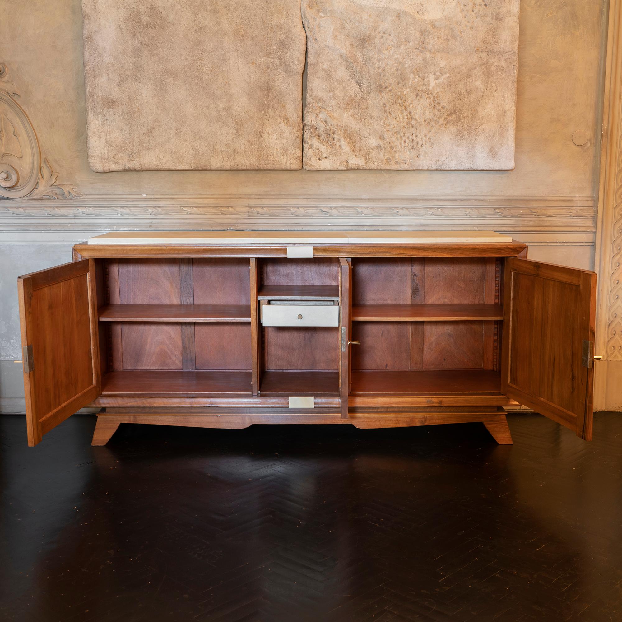 1940s French walnut and parchment sideboard, perfect condition and vintage patina, adjustable shelves and one parchment covered drawer, brass details.