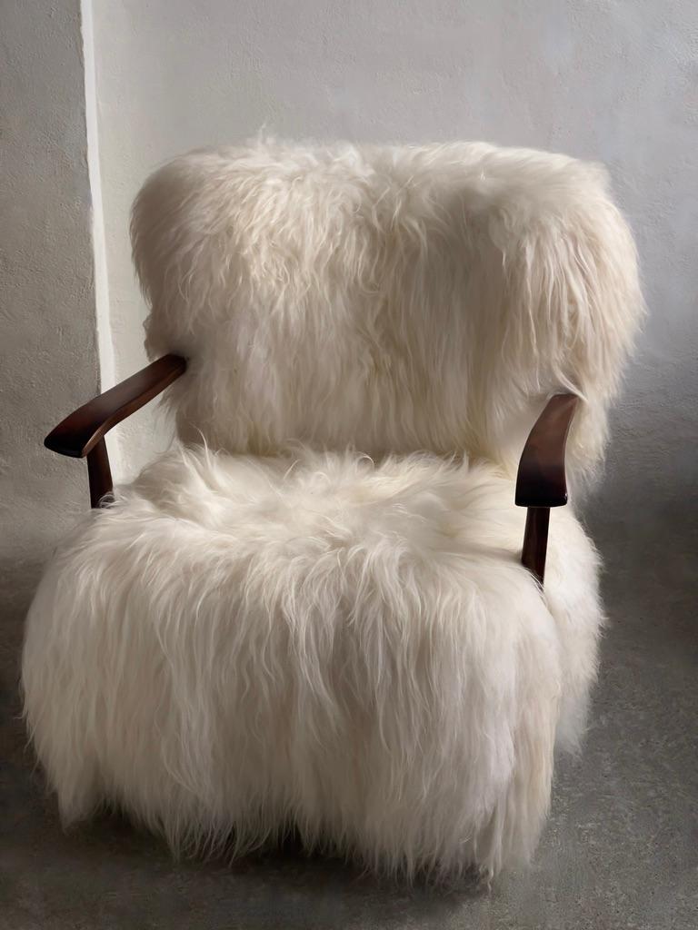Mid-20th Century 1940s Fritz Hansen Easy Chair Reupholstered in long haired Icelandic Sheepskin. For Sale