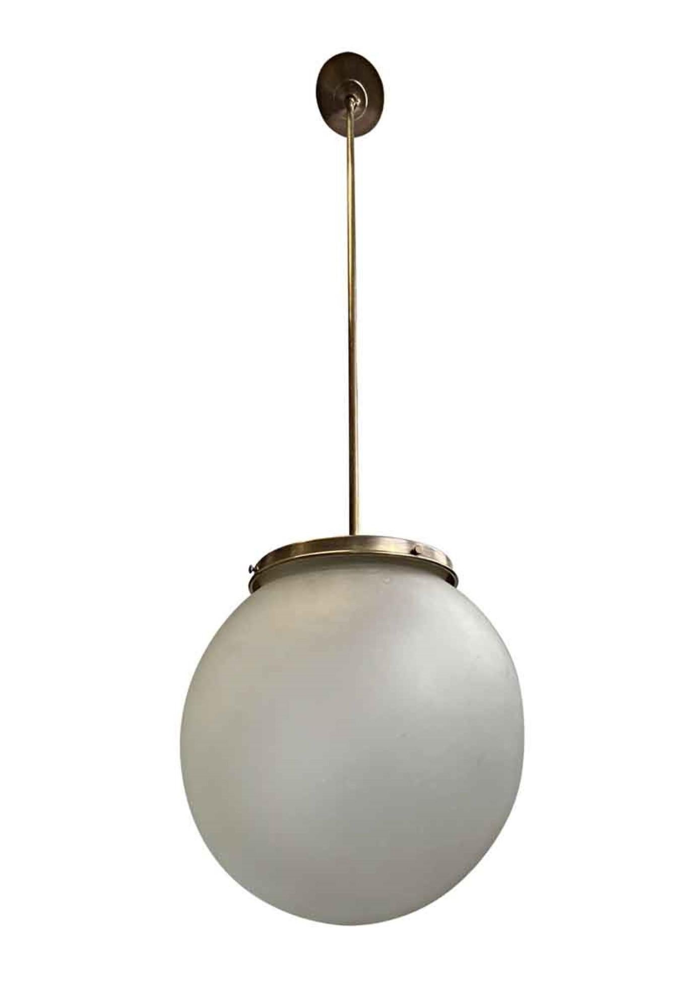 1940s Frosted Globe Pendant Light Antique Brass Finish Quantity Available In Good Condition In New York, NY