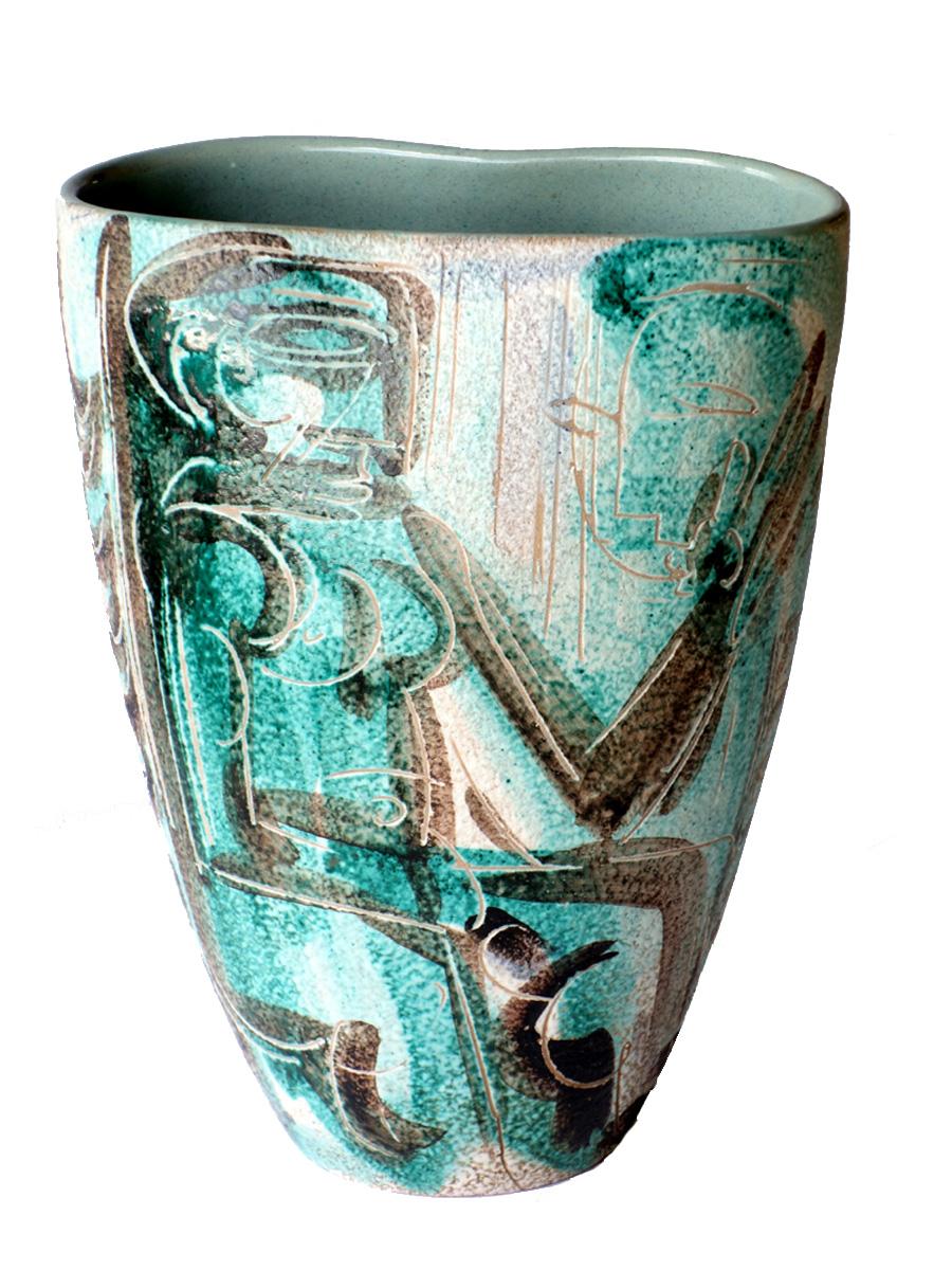 Rare vase en poterie polychrome
Parfait état.