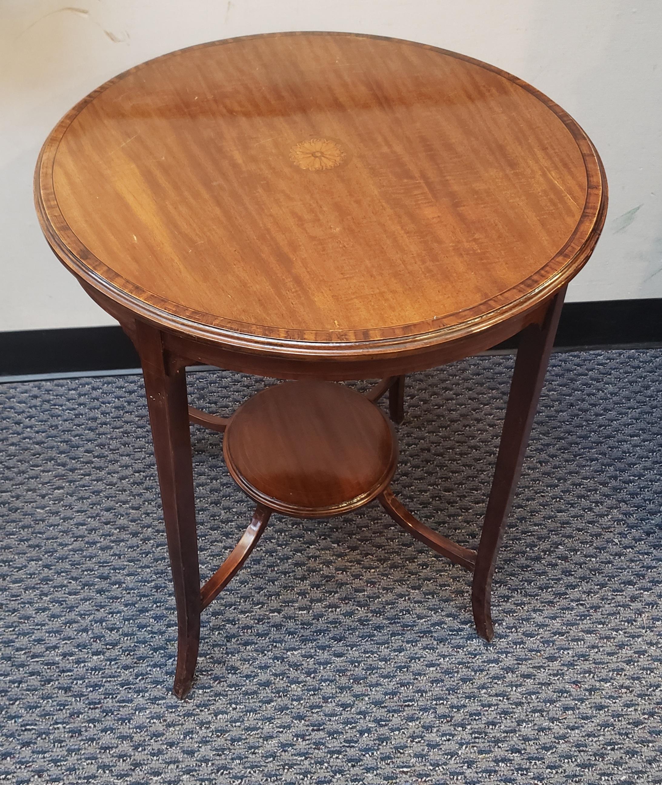 An exquisite George III Style Inlaid Mahogany center table or Side Table with lower tier stretcher joining the the 4 legs for a great stabilty. 