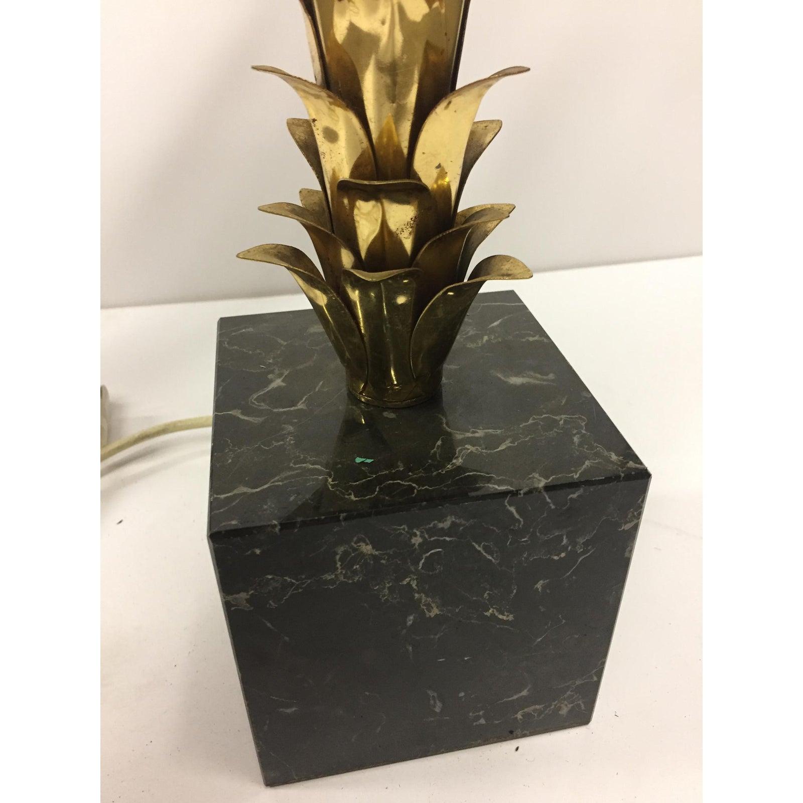 A unique brass palm tree table lamp with a black marble base, circa 1940s, Germany.