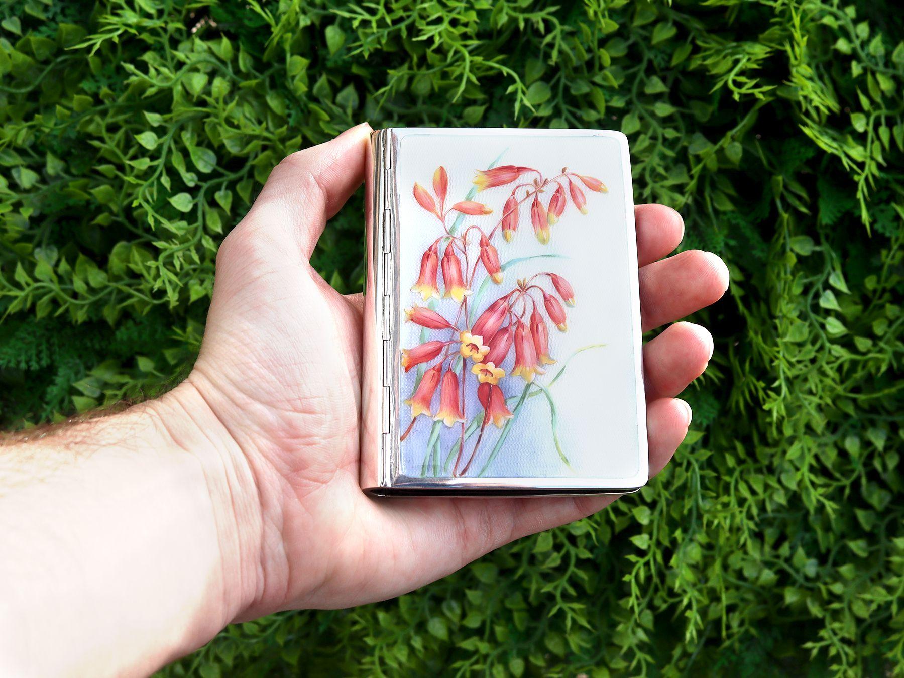 A fine vintage German silver and enamel card case; part of our boxes and cases collection.

This fine German vintage card case has a rectangular book shaped form.

The anterior surface of this vintage card case is embellished with a hand painted