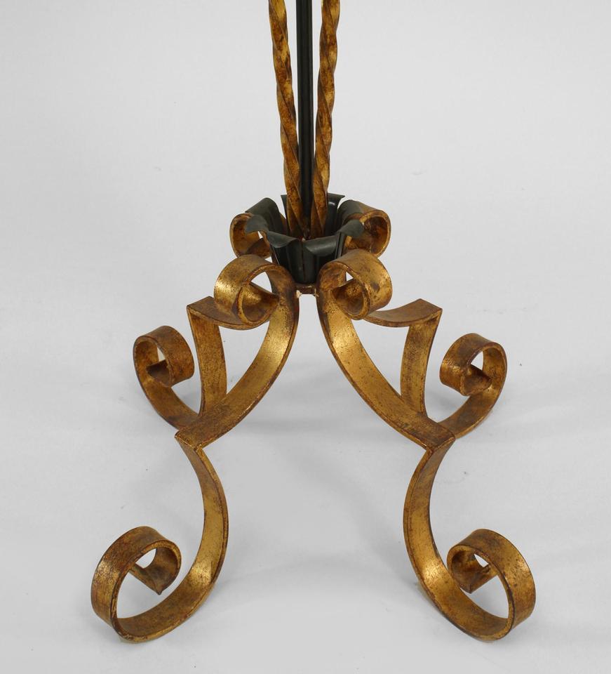French 1940s gilt metal and green painted trimmed floor lamp with 4 gilt scroll design legs supporting 4 twisted gilt metal extensions (style of GILBERT POILLERAT)
