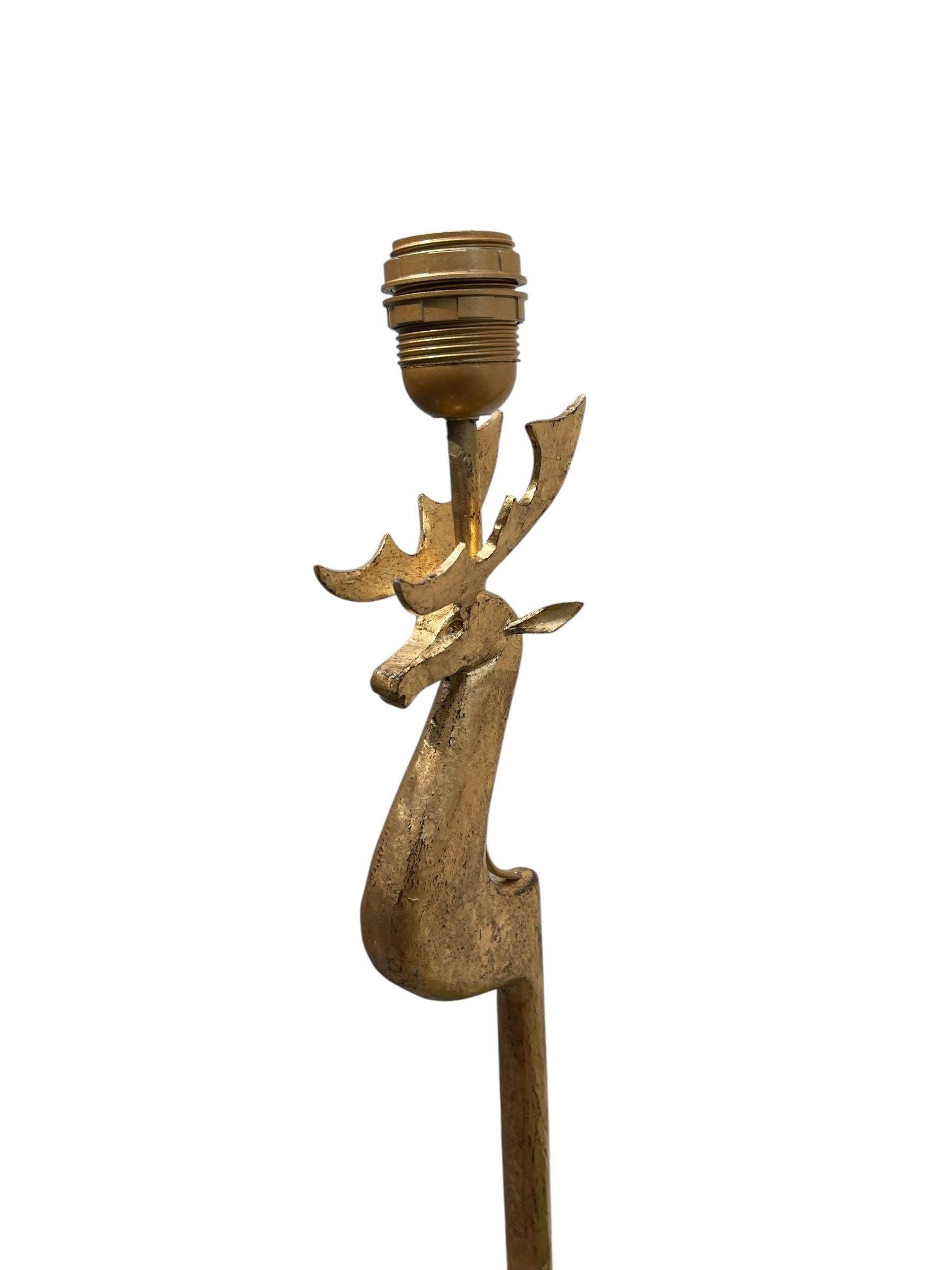 1940's Gilt Wrought iron floor lamp with a DEER head
Re-wired
Dimensions givenwithout shade 
No shade included
Shade diameter 30 cm