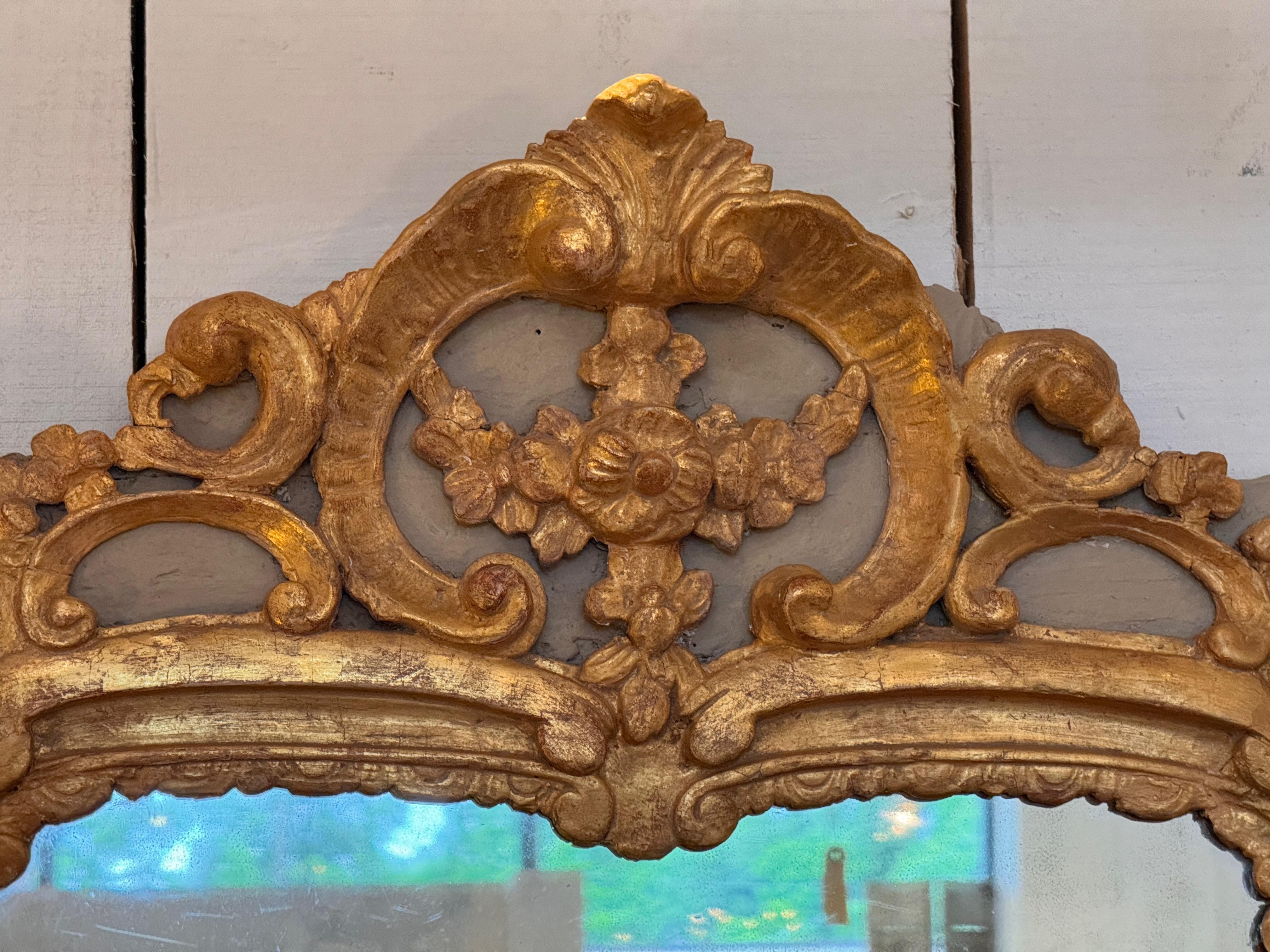 19th Century 1940s Giltwood Mirror With Floral Crest For Sale