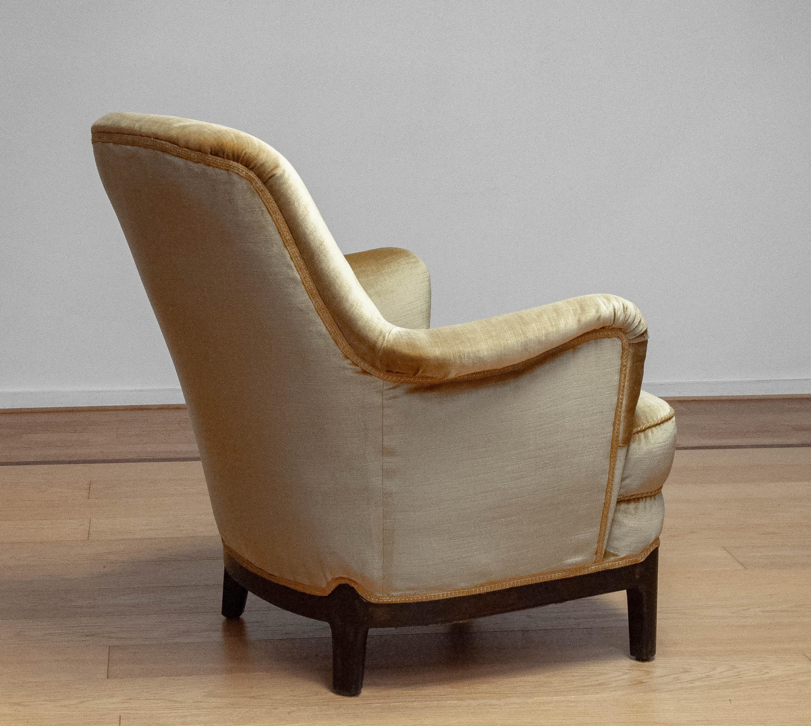 Swedish 1940s Gold Colored Velvet Upholstered Lounge Chair By Carl Malmsten Sweden For Sale