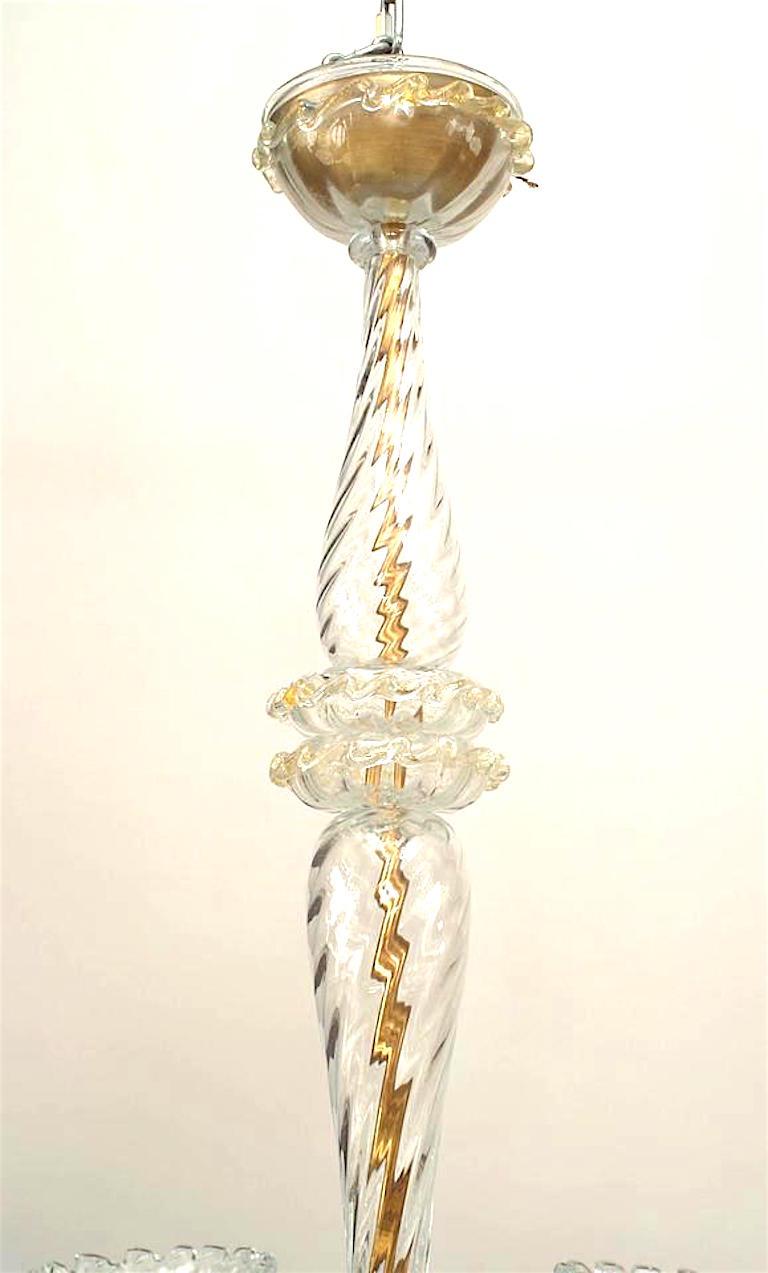 Italian (1940's) Murano chandelier with 6 swirl design gold dusted glass arms holding a large fluted clear bubble glass shade with scalloped top. (att: BAROVIER ET TOSO).
 