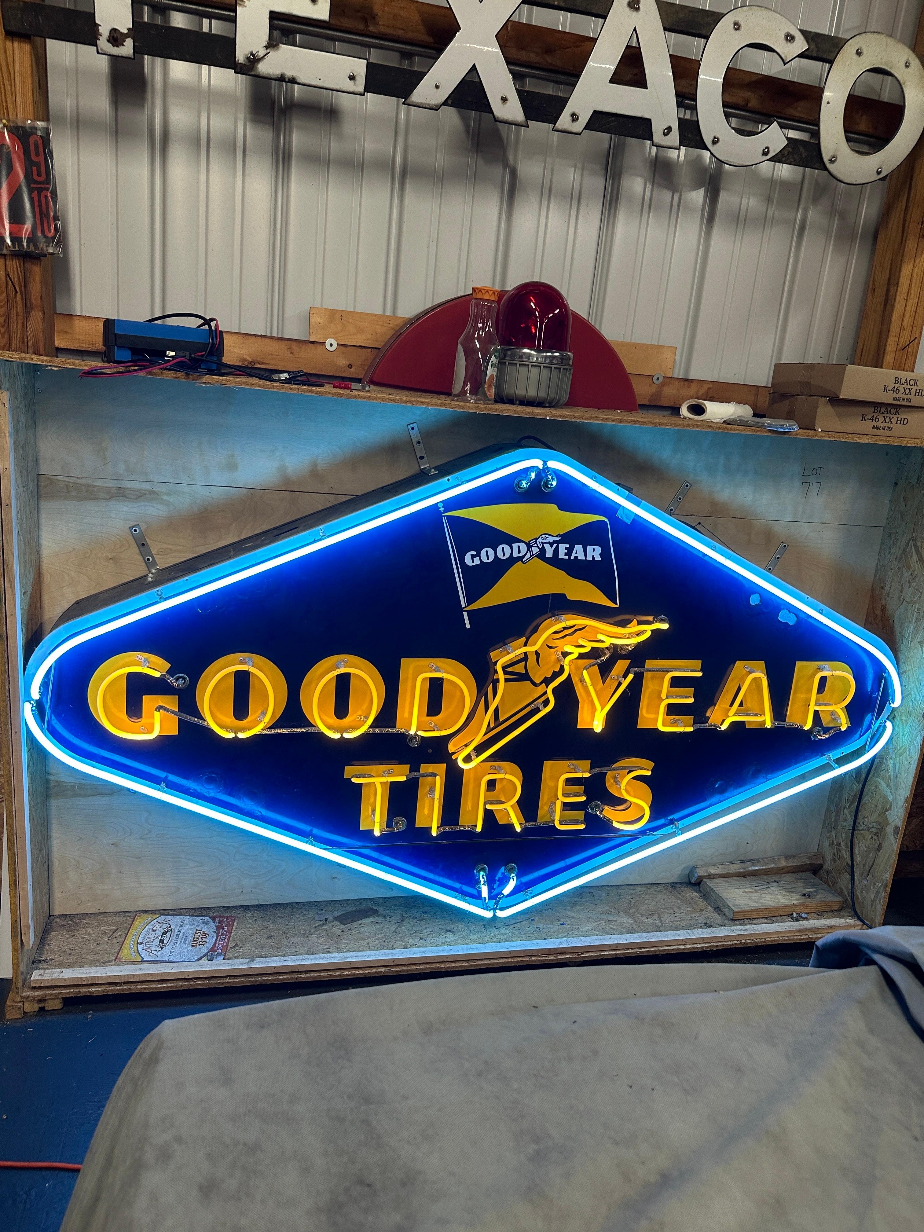 Very rare and beautiful example of a 1940's Goodyear Tires Neon light porcelain advertisement sign. Few occasional chips to porcelain finish and associate light/minor wear. Otherwise, this is a very good example of Goodyear Tires advertisement