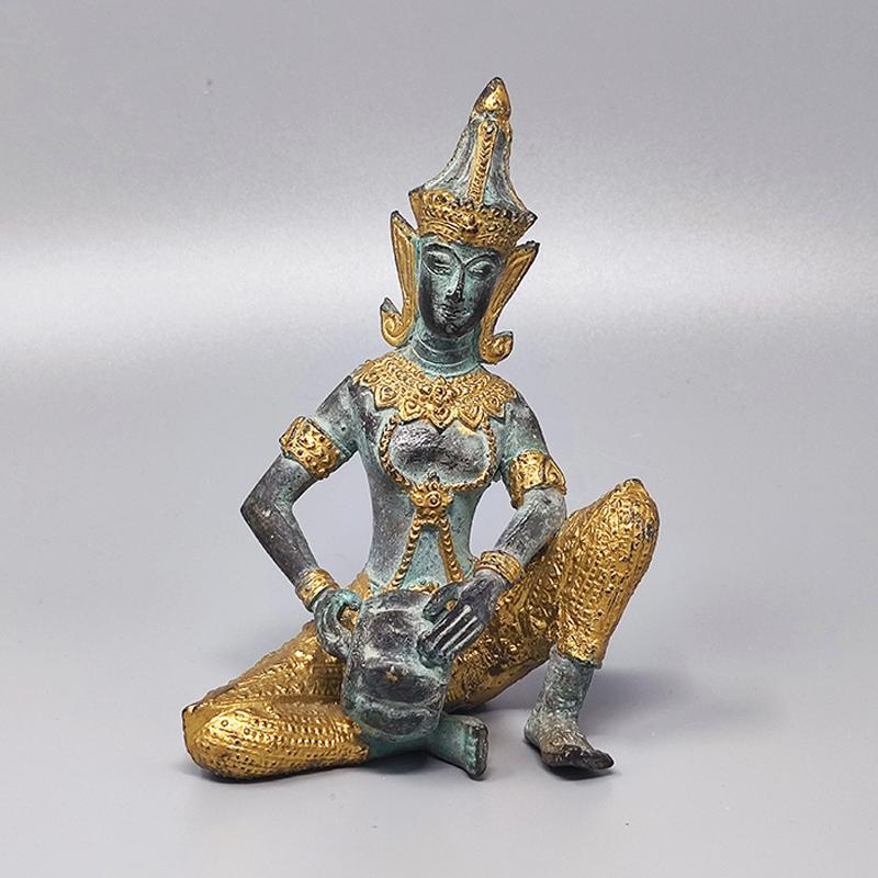 1940s, Gorgeous oriental decorative statue in bronze. Thai Deity. The item is in excellent condition. 
Dimensions:
4, 33
