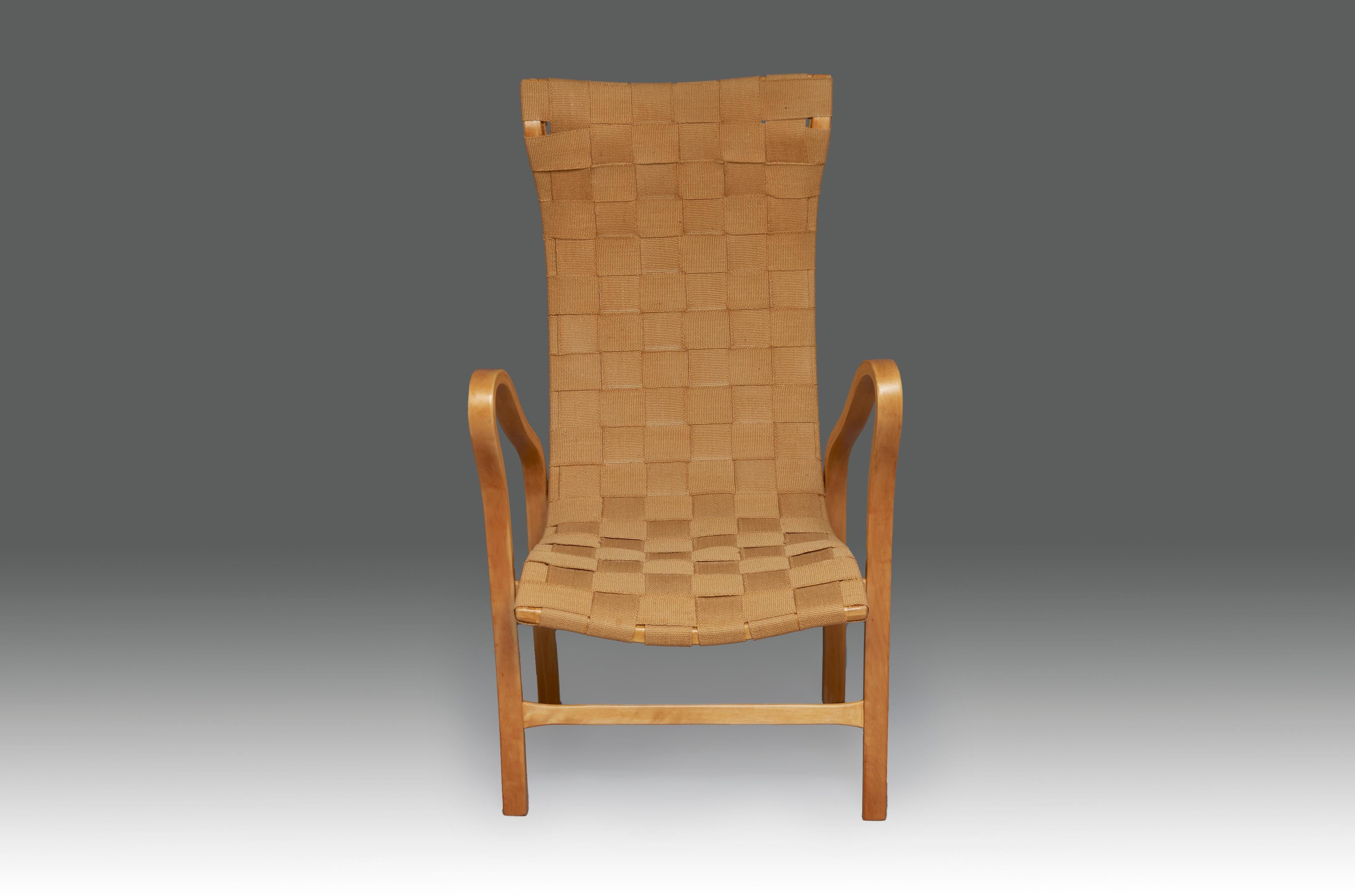 Gustaf Axel Berg”Torparen” armchair in bent birch plywood and braided hemp fabric. Sweden, 1940s.
Perfect restored condition and light traces of use in the hemp braid.
 