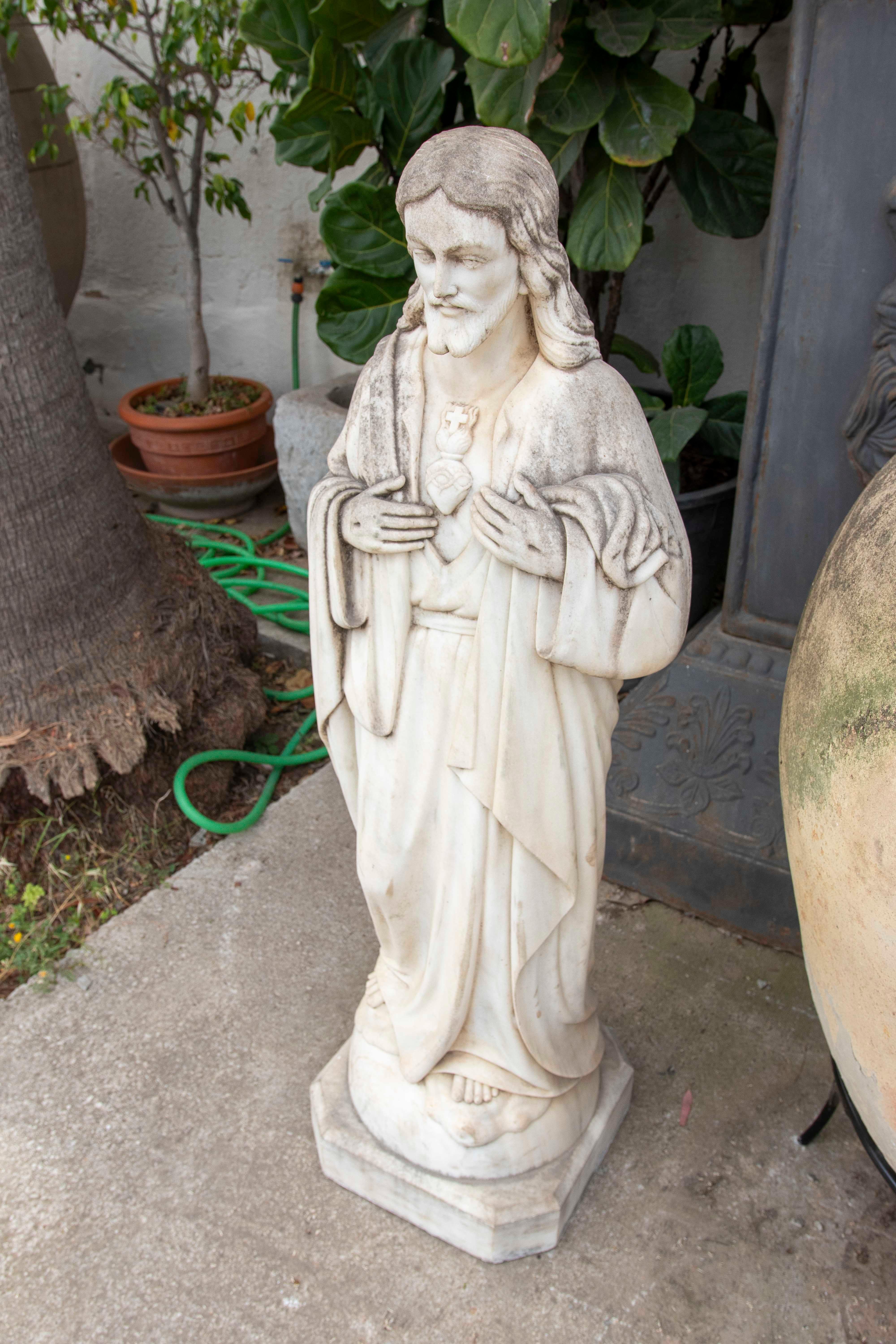 Scultura in marmo scolpita a mano degli anni '40 raffigurante Gesù Cristo del Sacro Cuore  