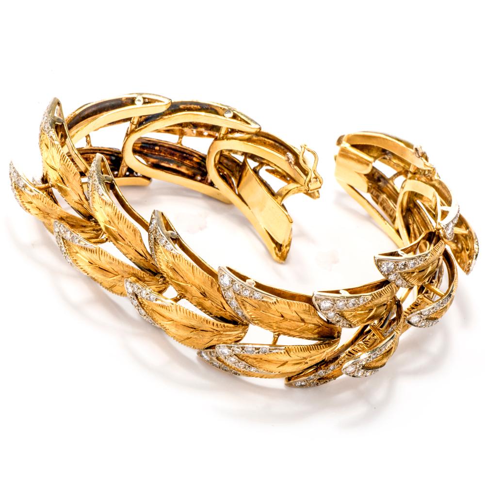 Tickle your fancy with this extraoridinery stunning hand engraved 1940s Feather Bracelet!

Crafted in 58.9 grams of 18K yellow gold and spanning 6.75 inches.
This masterpiece features 3 feathers per link that have each been intricately detailed and