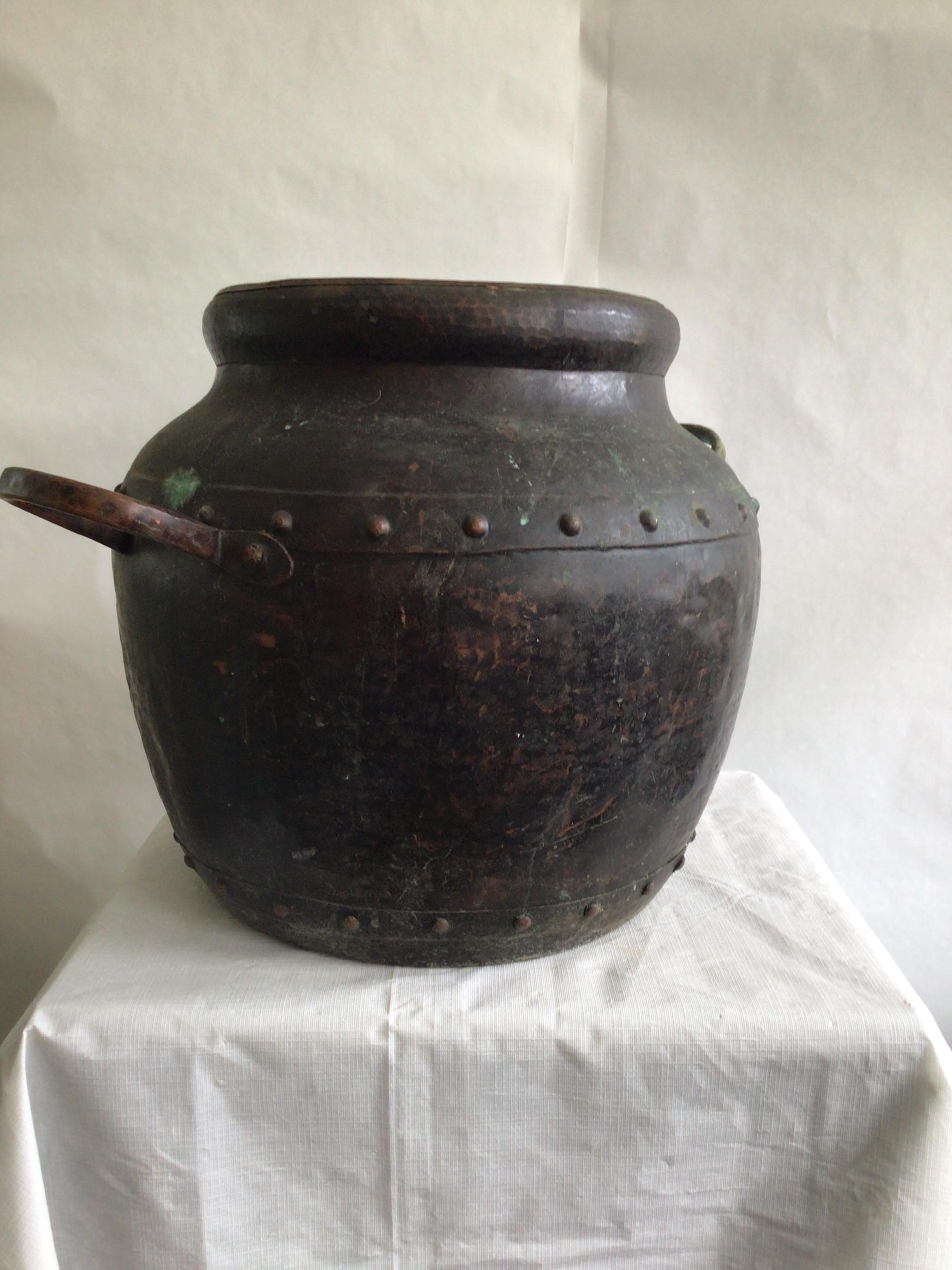 Hand-Crafted 1940s Hand Hammered Studded Patinated Copper Pot With Handles For Sale