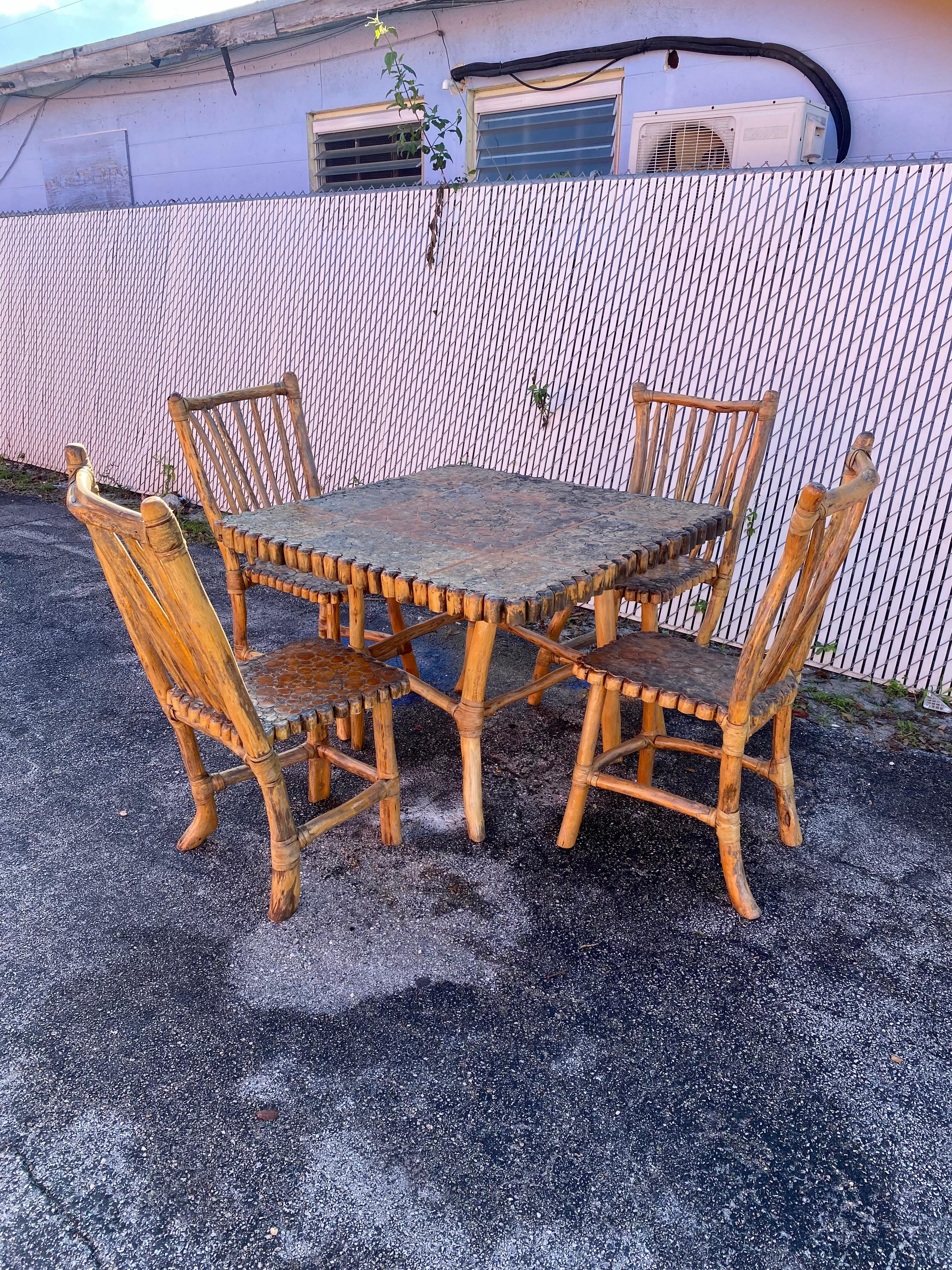 On offer on this occasion is one of the most stunning, rare, handmade and crafted rattan dining set you could hope to find. Outstanding design is exhibited throughout. The beautiful sculptural set is statement piece which is also extremely