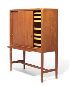 1940s Hans Wegner Tall Teak Cabinet, with 2 Carved Doors and Pull-out Leaf