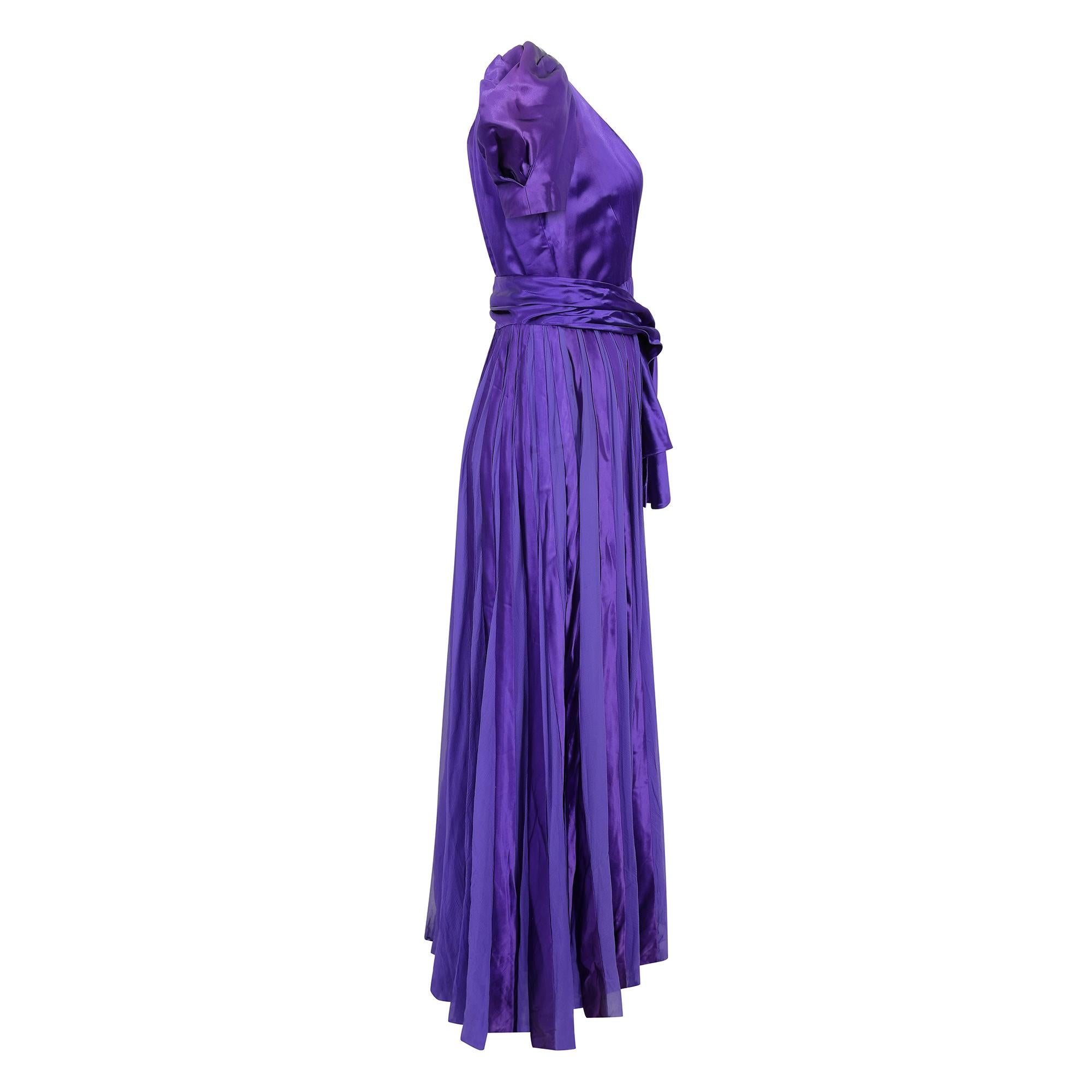 Original late 1930s or early 1940s purple satin and chiffon gown with matching waist sash. This beautiful unlabelled haute couture dress is of superb quality and construction and is in absolutely incredible vintage condition. The skirt finish is