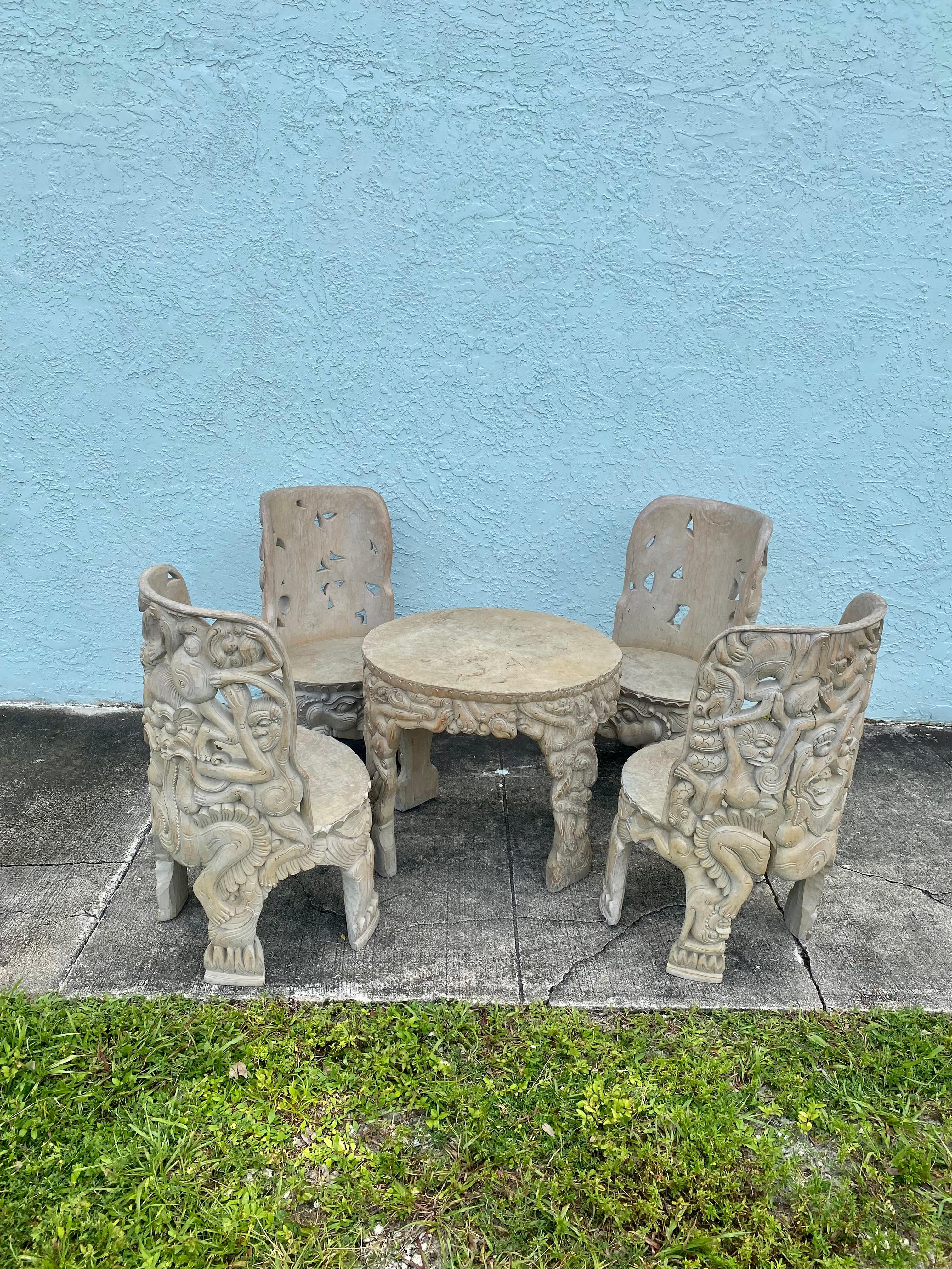 On offer on this occasion is one of the most stunning, table and chairs you could hope to find. This is an ultra-rare opportunity to acquire what is the most spectacular and beautifully-presented figurative chairs and table set. Outstanding design