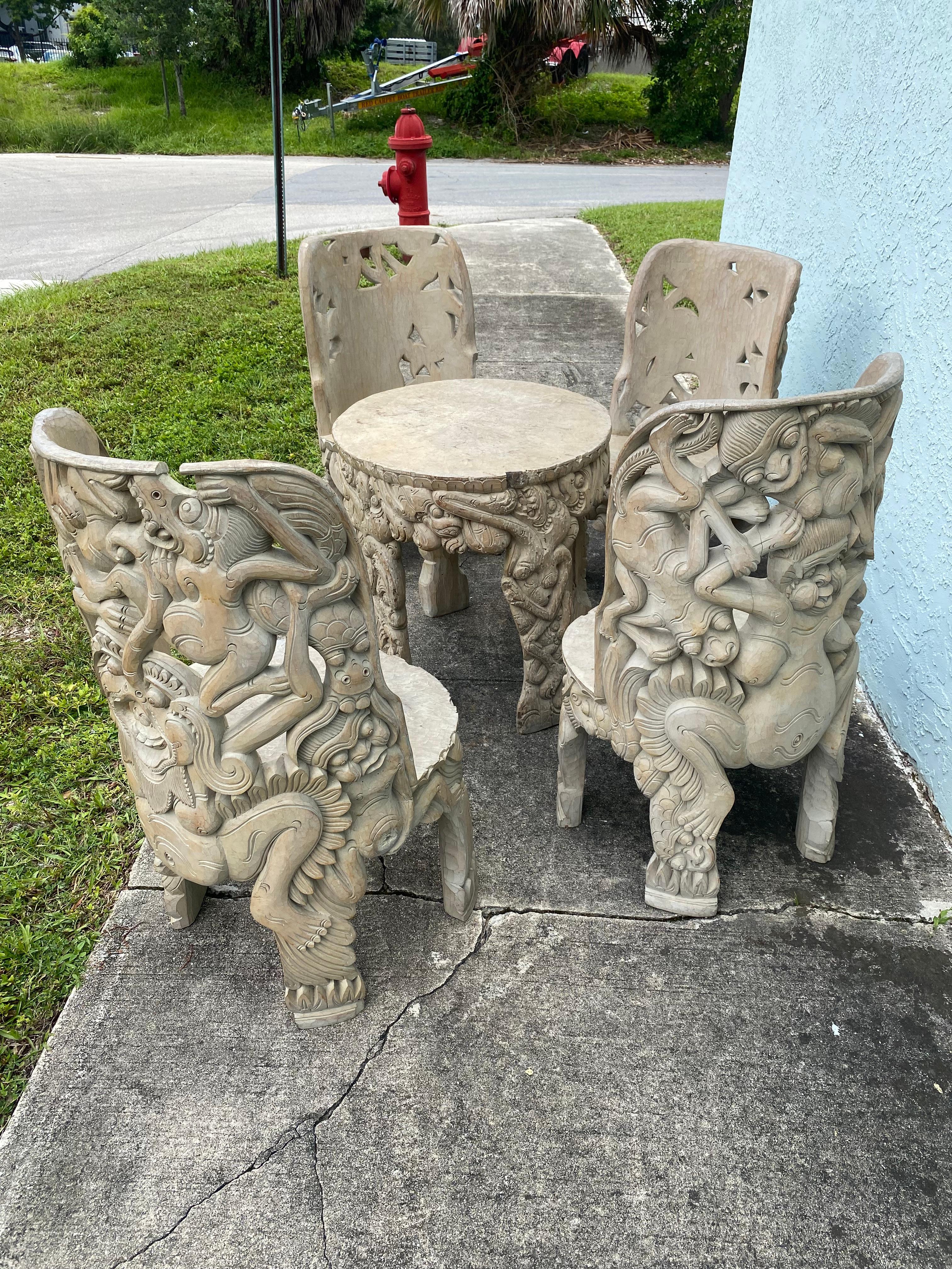 1940s Heavily Hand Carved Folk Art Figurative Chairs Table Set, Set of 5 In Good Condition For Sale In Fort Lauderdale, FL