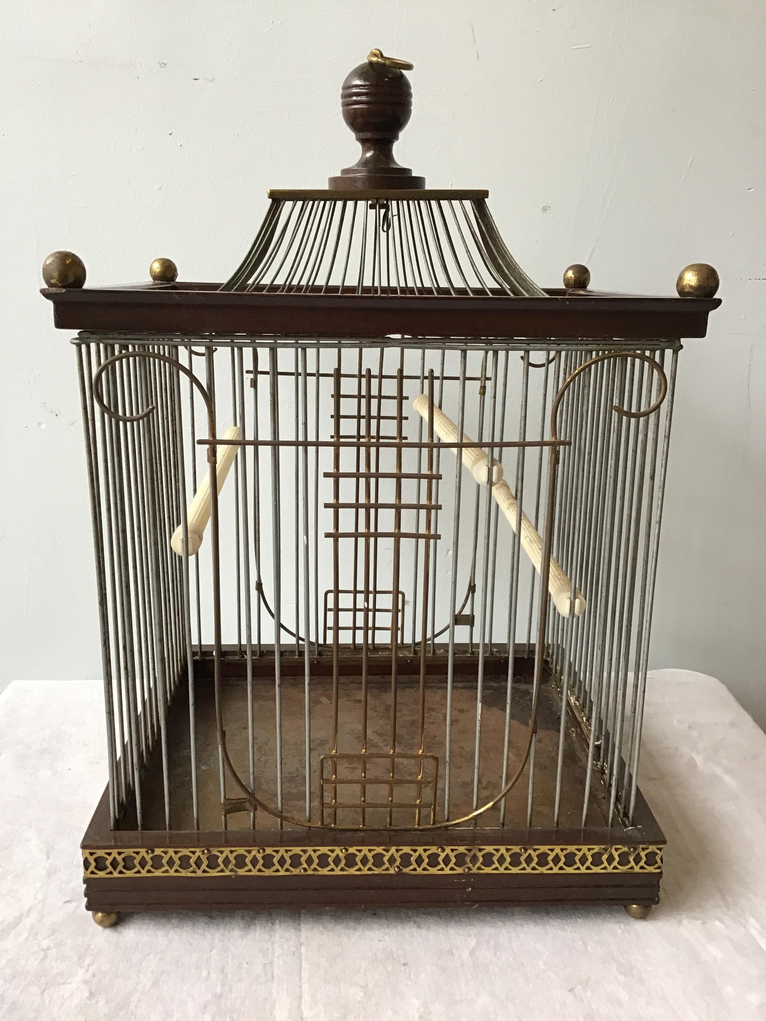 1940s Wood pagoda bird cage by Hendryx.