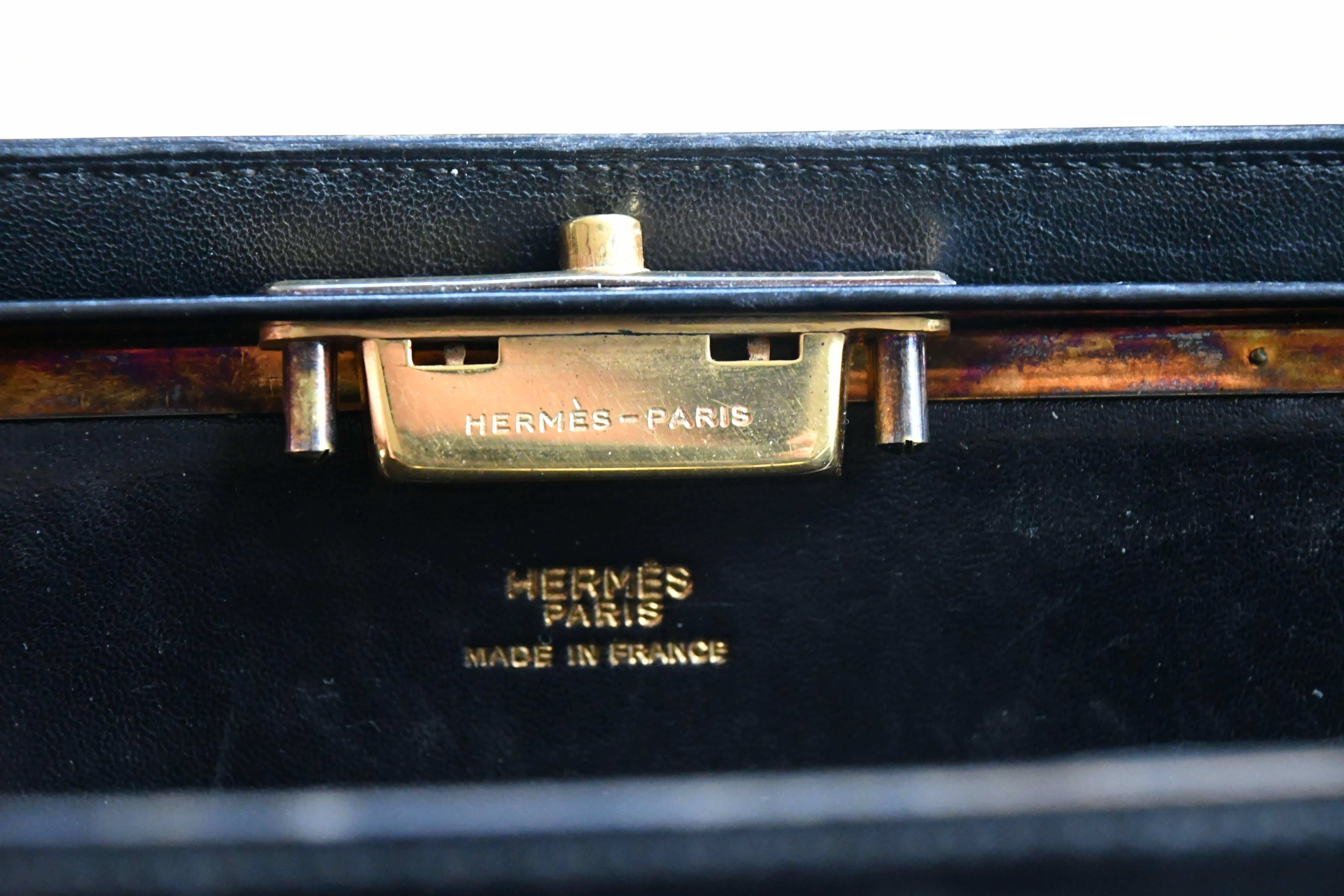 Black soft circa 1940s Hermes bag with gilt hardware. Very clean inside and out, fine overall leather wear. Tassel inside intact, all signatures. About 12.5