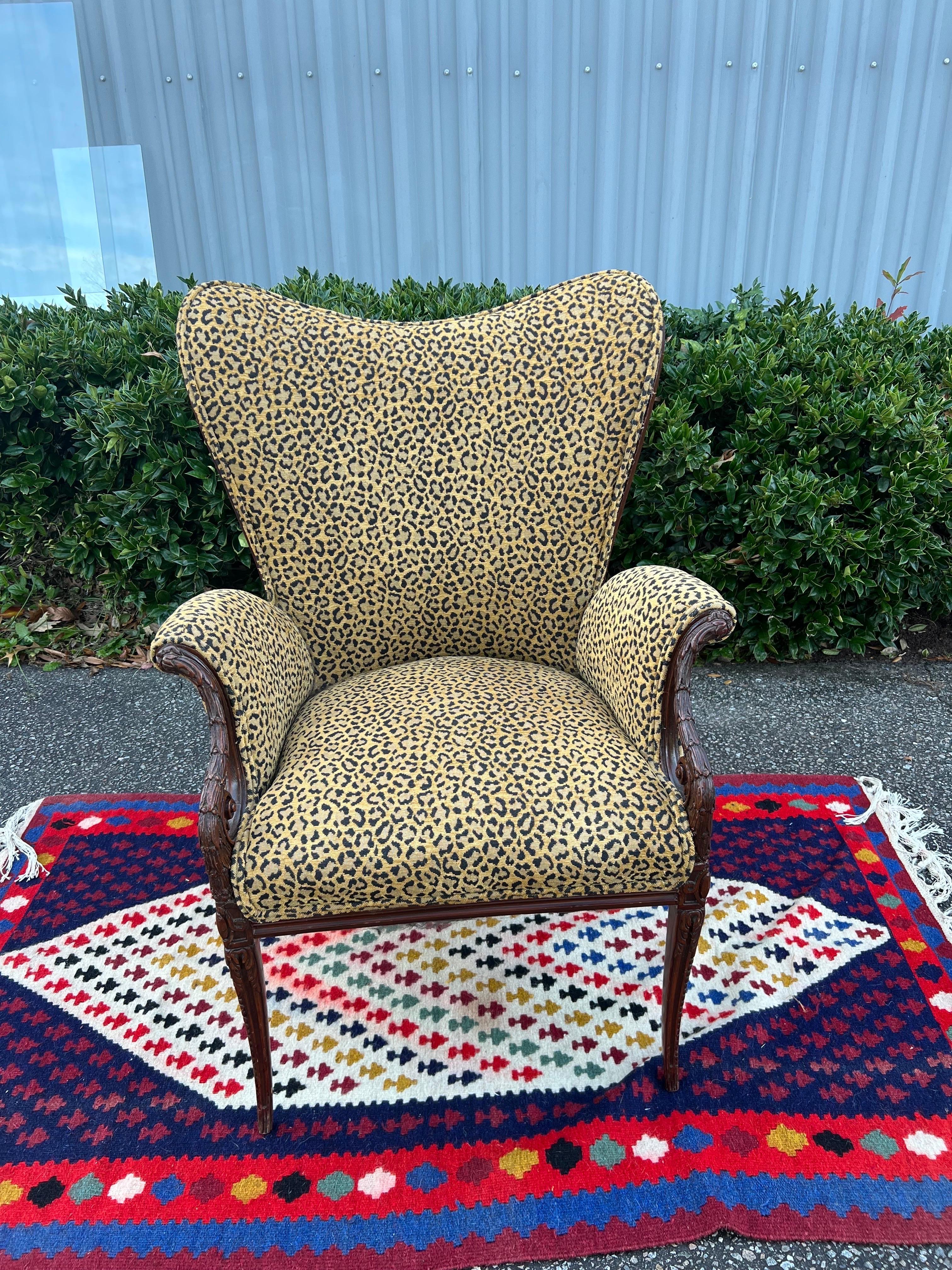 1940's Grosfeld House Style Feathered Arm Lounge/ Fireside Chair.  Previously reupholstered in a cheetah print.  Fabric is still in very good condition.  Excellent bedroom chair!