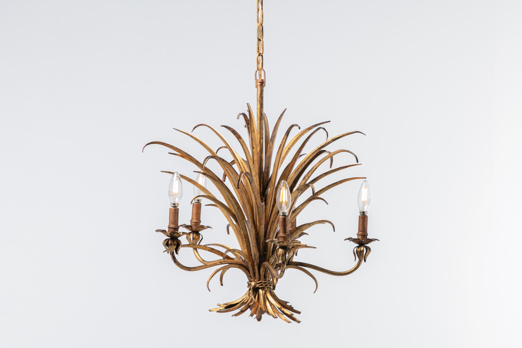 Gilt 1940s sheaf of wheat Hollywood Regency pendant chandelier by Hans Kögl fully restored from top to bottom by UL Certified Professionals. This particular Hans Kögl chandelier was originally brought to the US by a World War II American GI when