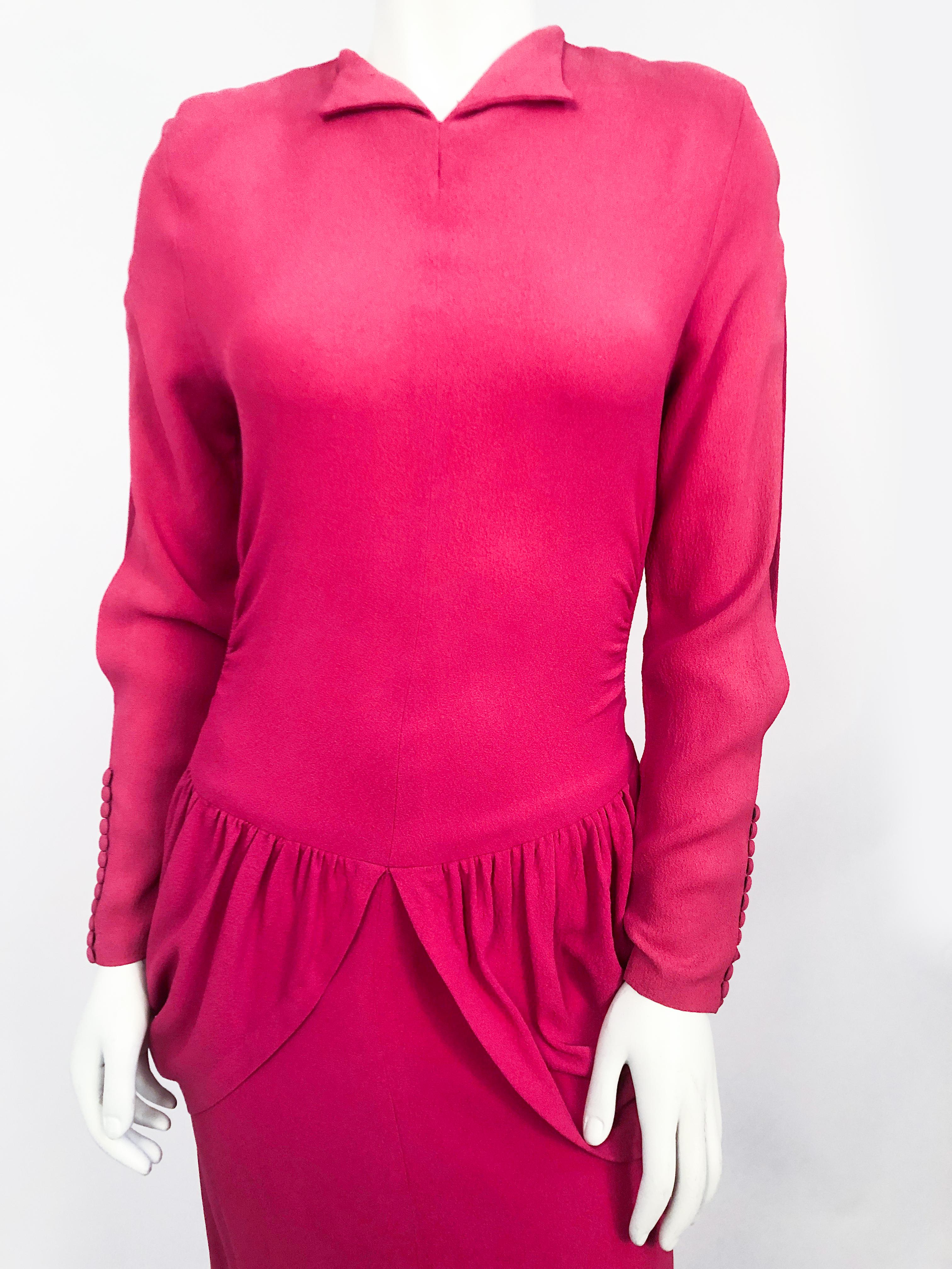 1940s Hot Pink Dress with Flounces and Draped Panels on the hip. Also has sleeve slits, folded collar, modified peplum in the back and slight high-low hem.
