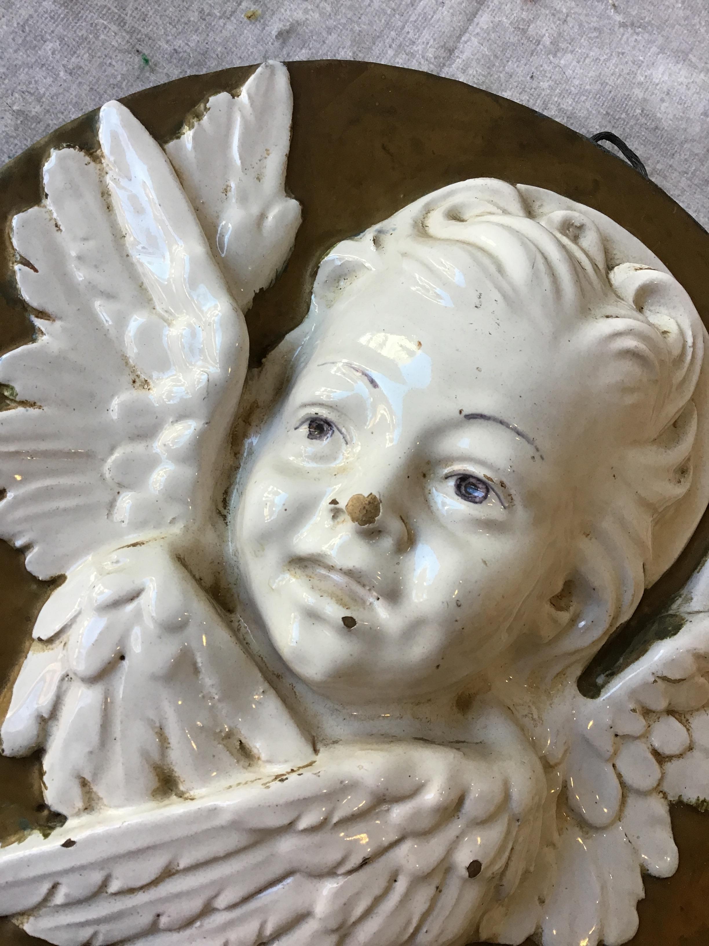 1940s Italian ceramic angel plaque. Hand painted, glazed finish on angel.