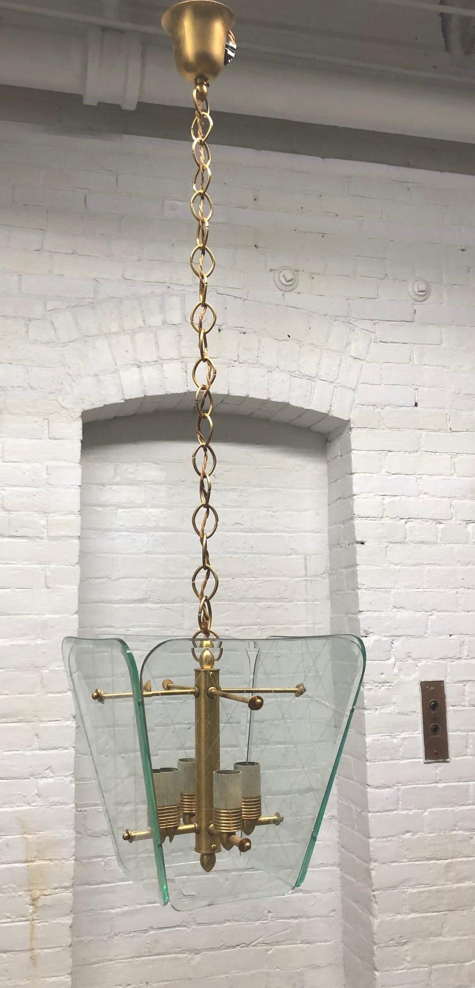 1940s Italian light fixture attributed to Pietro Chiesa for Fortana Arte. This glass has an etched diamond pattern with brass.
Measures from top to bottom: 37.5 H. Light fixture itself: 10 W x 9.5 H x 10 D.