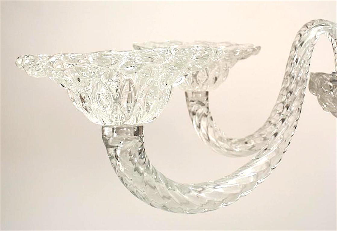 Italian Venetian Murano (1940's) clear glass chandelier with swirl design center post and 5 arms supporting large scalloped and internal bubble design bob√©che. (att: BAROVIER E TOSO)
