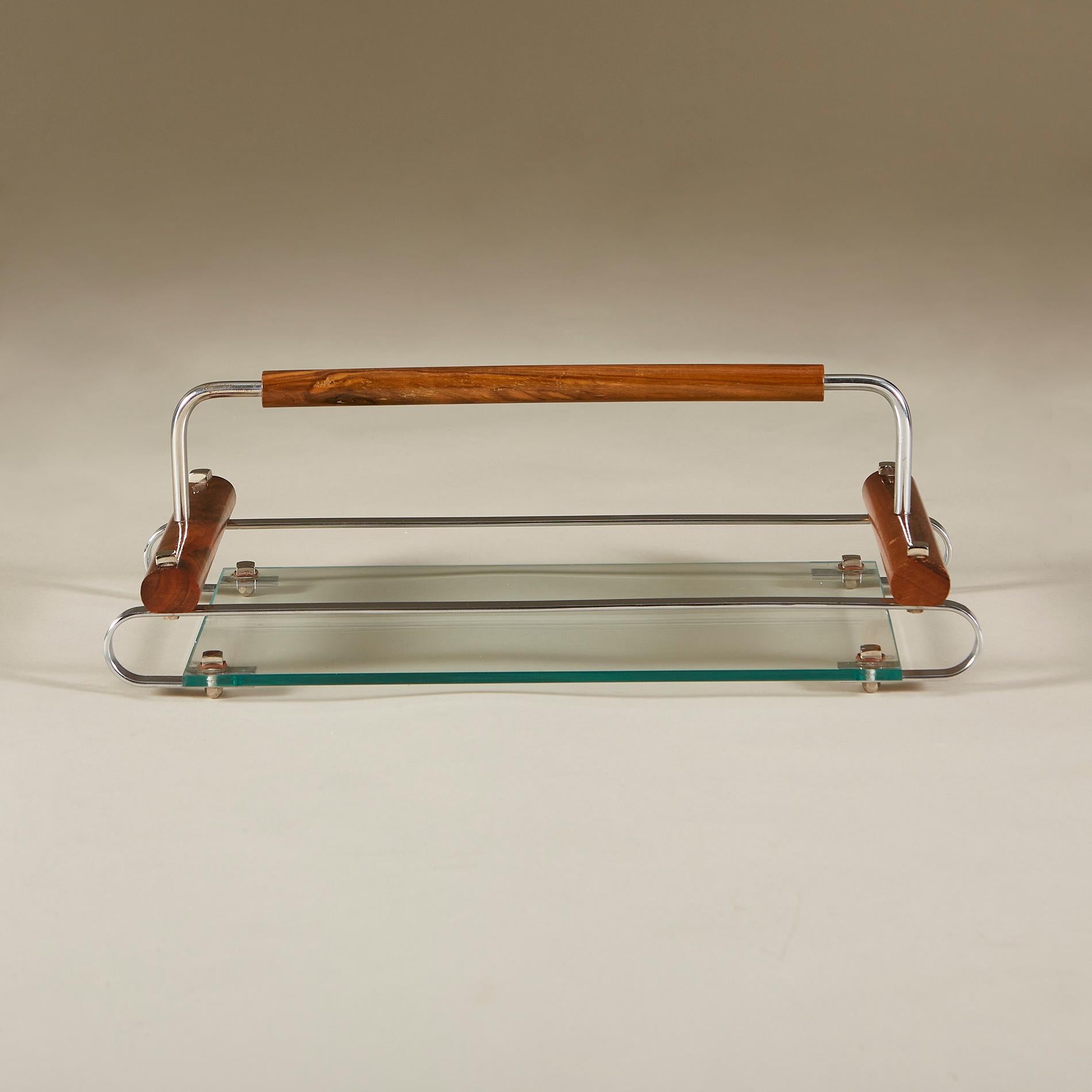 Elegant cocktail tray with fruitwood handle and fruitwood and chrome decorative frame. Glass base sits on chrome feet.