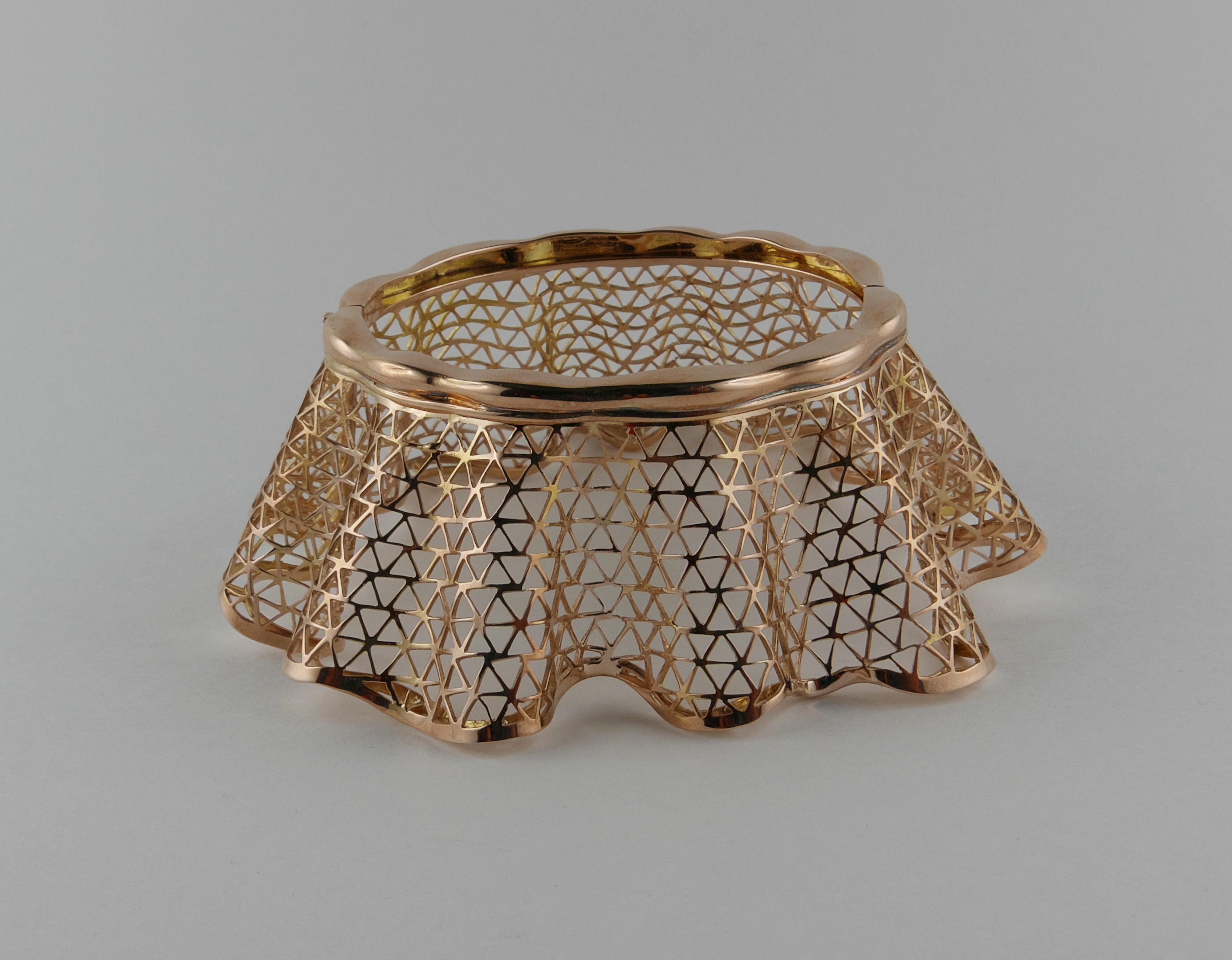 Sleek and unconventional extra wide 1940s Bracelet with Lictorian Fasces stamp, crafted in Italy in 18 karat Rose Gold, featuring a hand-woven design accented with curled edges that create a harmony of texture and flow. Entirely hand made, the