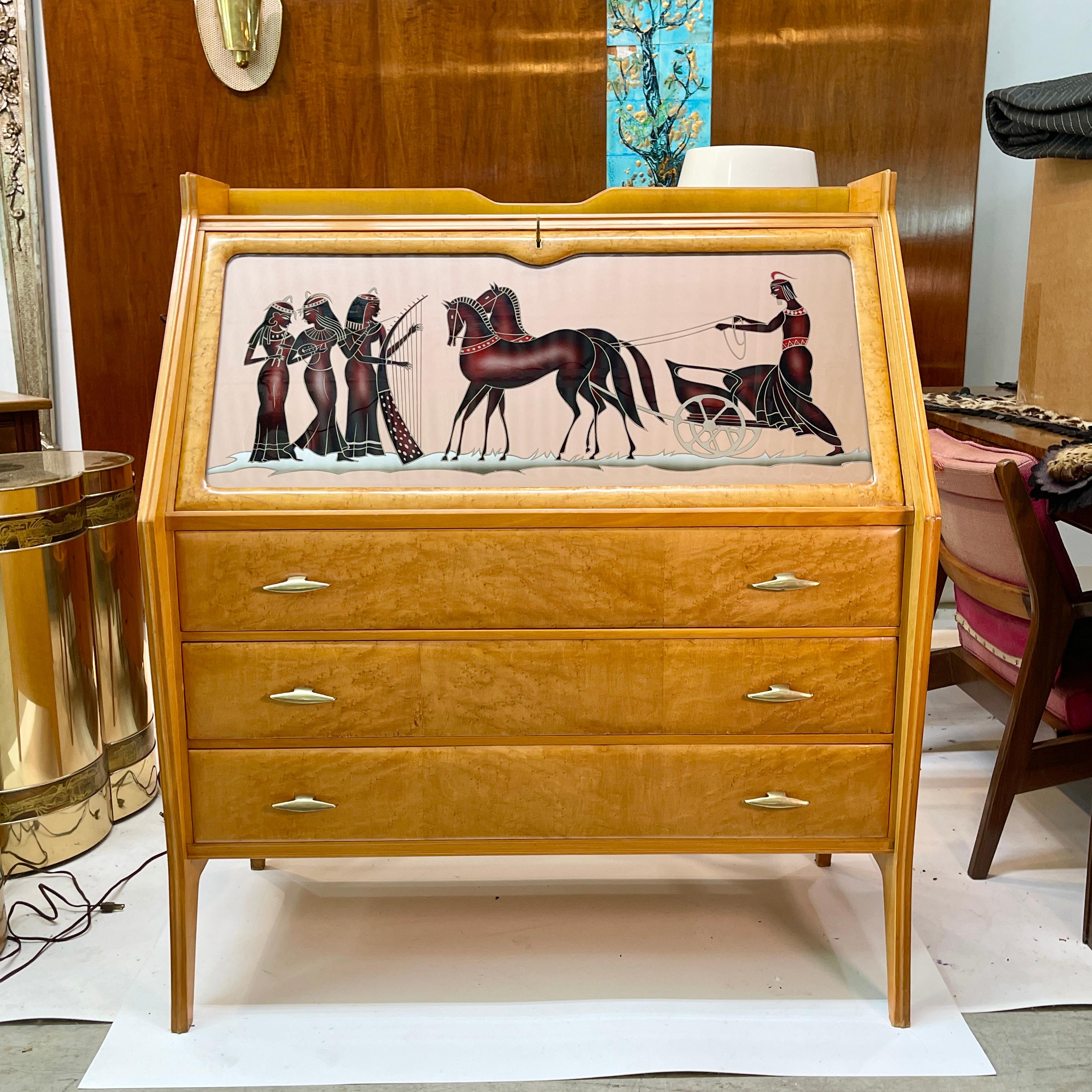 Golden birch veneered drop front secretary desk with three drawers and reverse painted glass panel of stylized Egyptian women and a charioteer similar to a design by Osvaldo Borsani (see last image)
Interior fitted with three small drawers and